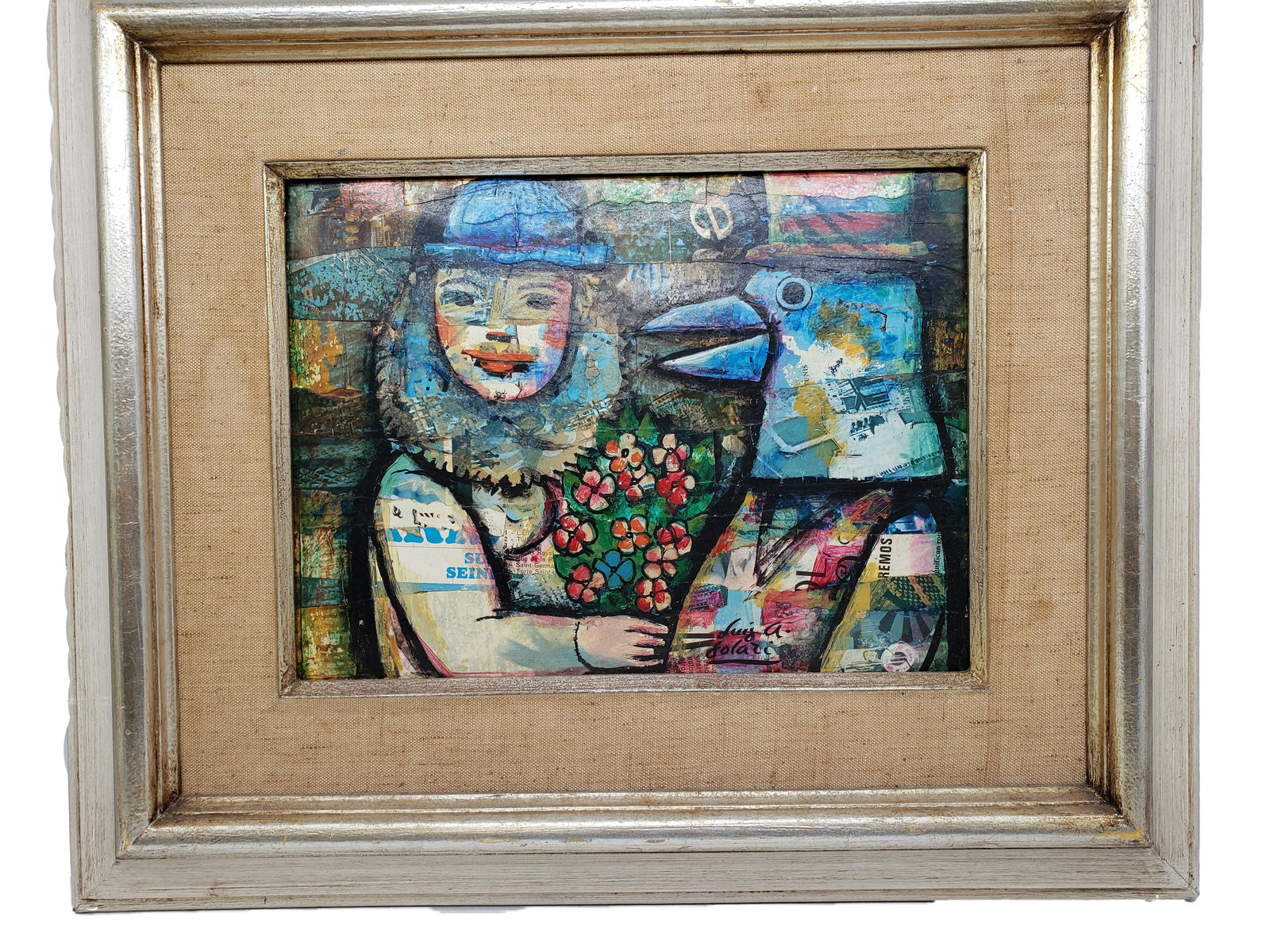 LUIS A. SOLARI PAPIER MACHE COLLAGE ON BOARD SIGNED: Luis A. Solari Papier Mache Collage on Board - Signed and Titled "Flower Girl and Birdman" Frame is 22 1/2" x 26 1/2" Art is 15 1/2" x 11 1/2" All item for this Auction Located in in Hollywood Florida
