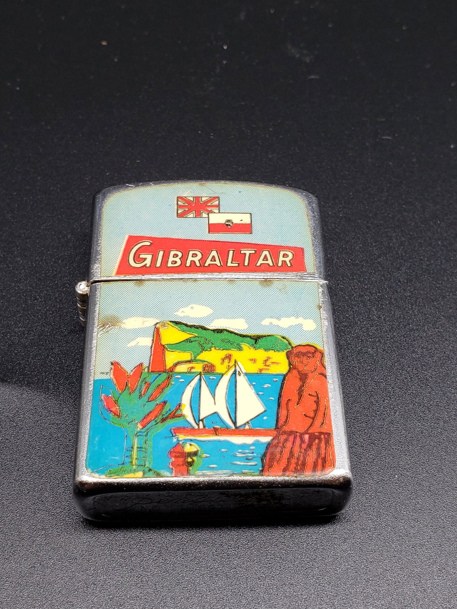 VINTAGE PENGUINO GIBRALTAR LIGHTER: VIntage Penguino Gibraltar Lighter Piece is 2" x 1 1/2" All items for this Auction Located in in Hollywood Florida Warehouse For Shipping Call today for quote they have item numbers and Pak Mail is av