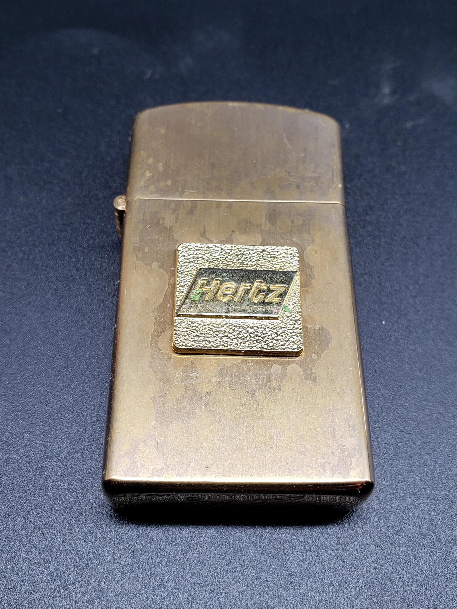 VINTAGE HERTZ ZIPPO LIGHTER: Vintage Hertz Zippo Lighter Piece is 2 1/4" x 1 1/4" All items for this Auction Located in in Hollywood Florida Warehouse For Shipping Call today for quote they have item numbers and Pak Mail is avail
