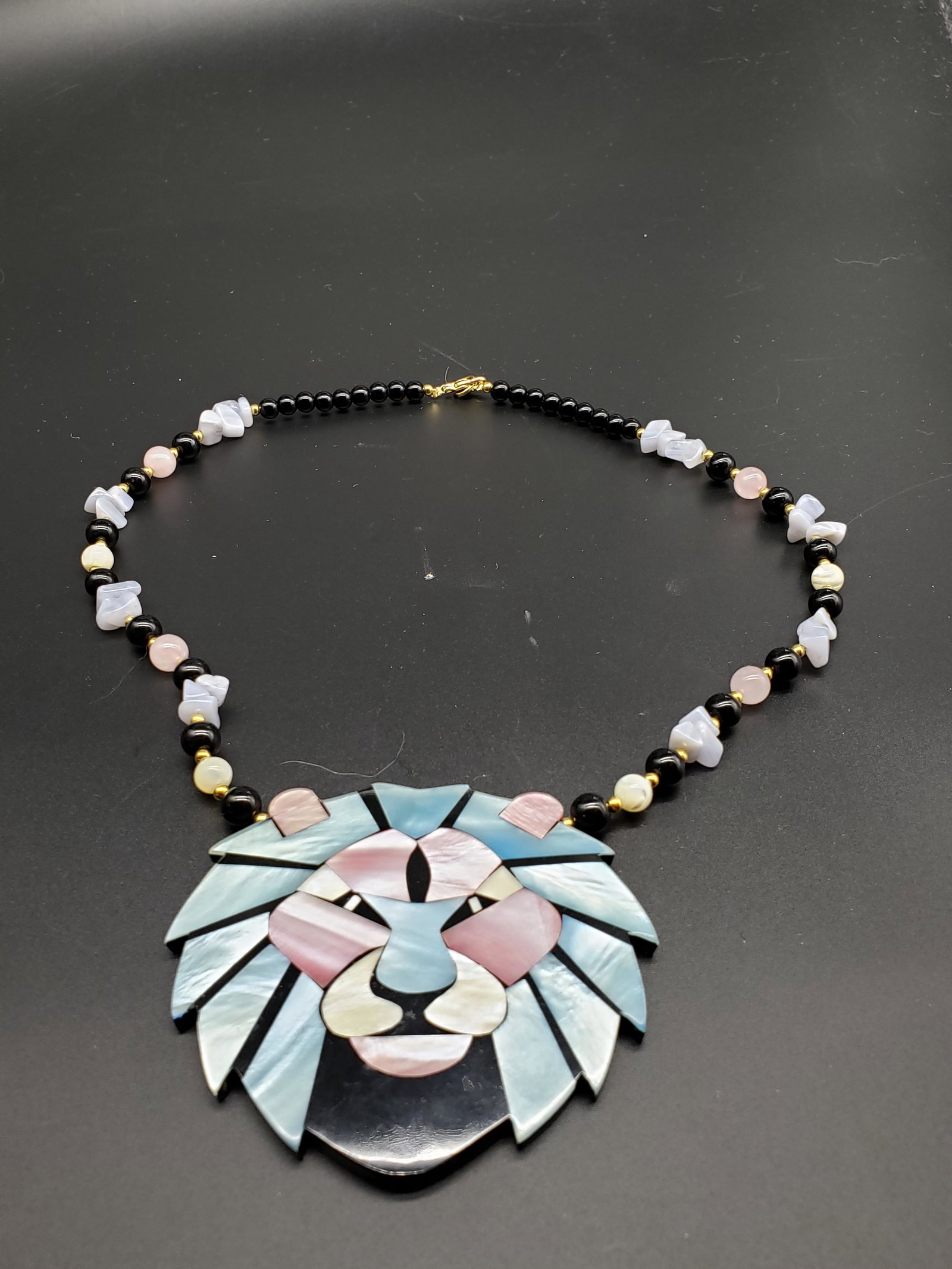 LION LUCITE NECKLACE: Lion Lucite Necklace Piece is 12" Long Lion is 3" x 3 1/4" All items for this Auction Located in in Hollywood Florida Warehouse For Shipping Call today for quote they have item numbers and Pak Mail is