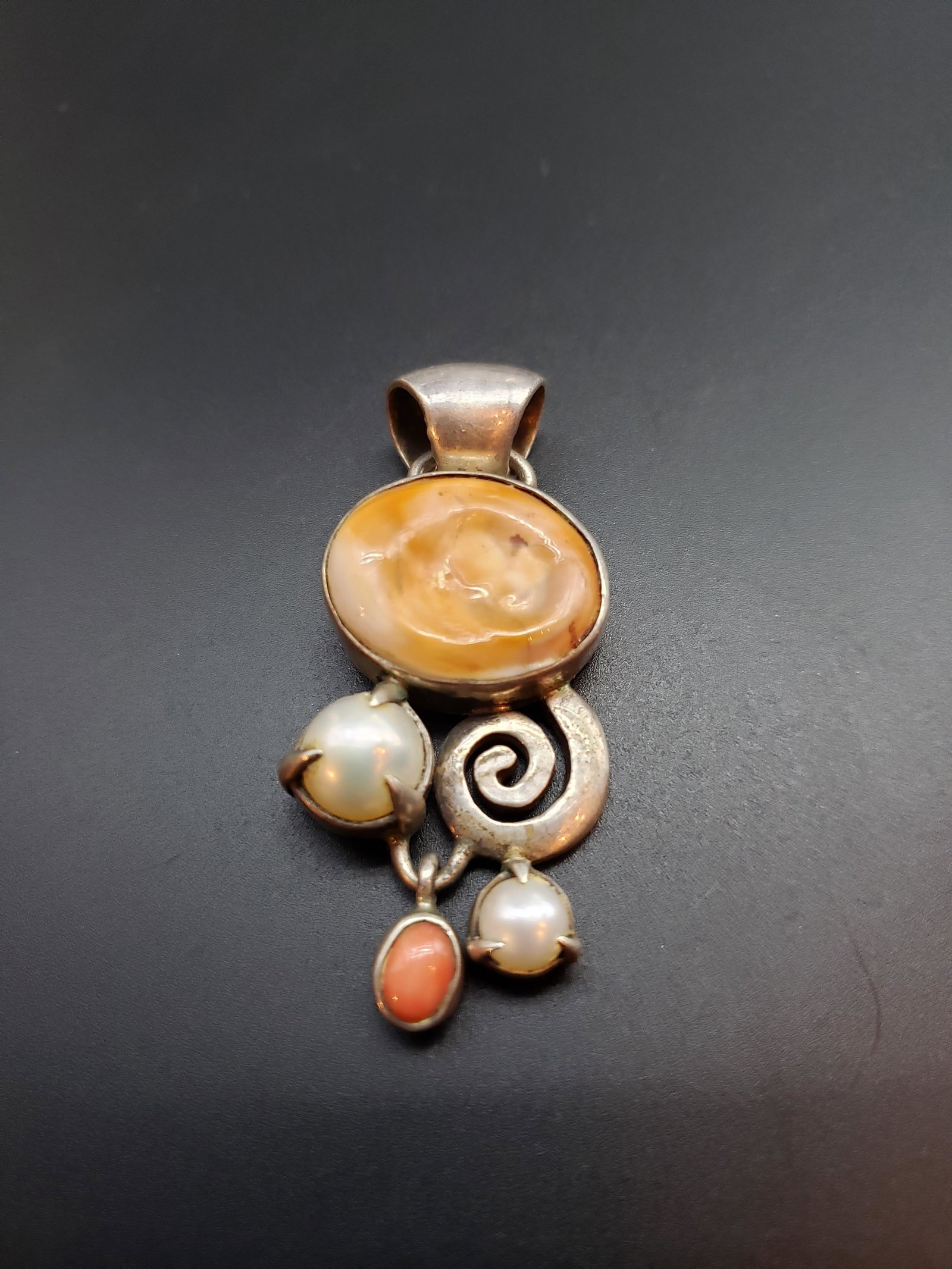 SILVER CORAL PEARL PENDANT: Silver Coral Pearl Pendant Piece is 2" x 1" All item for this Auction Located in in Hollywood Florida Warehouse For Shipping Call today for quote they have item numbers and Pak Mail is available for a