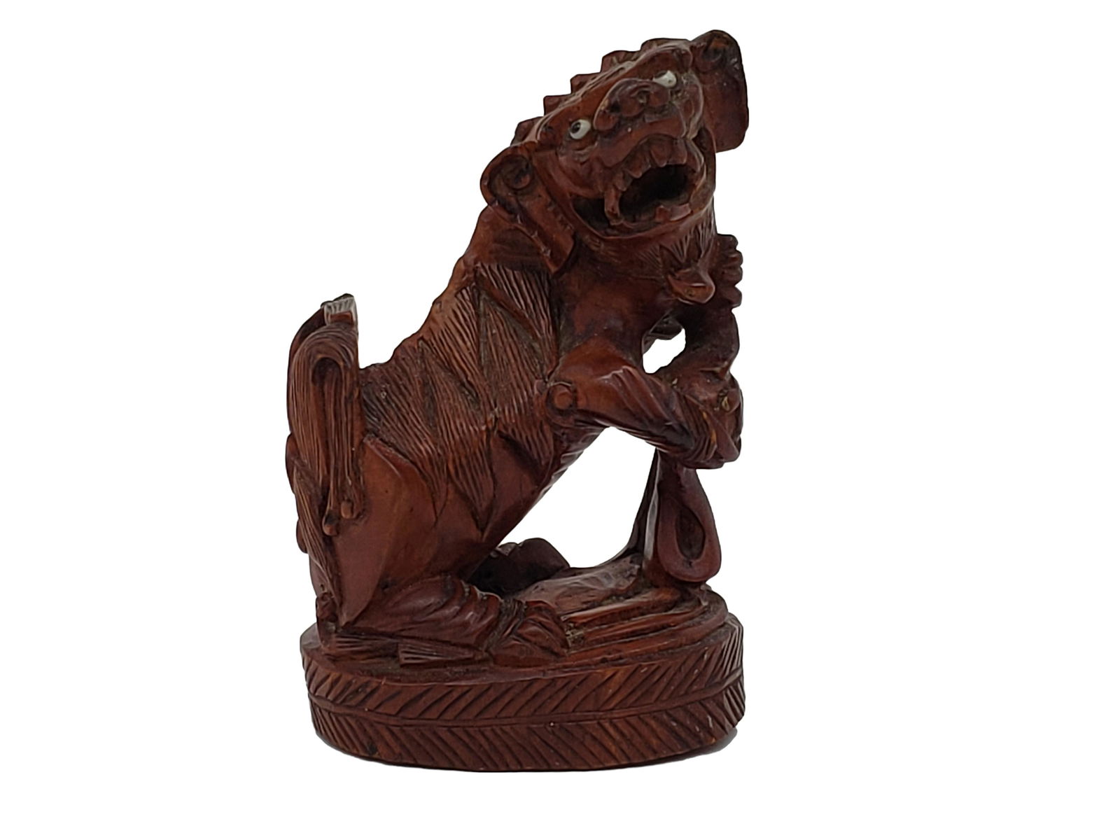 ANTIQUE TEAK HARDWOOD FOO DOG CARVING: Antique Teak Hardwood Foo Dog Carving with Glass Eyes Piece is 4" x 2 3/4" All items from this Auction Located in in Hollywood Florida Warehouse For Shipping Call today for quote they have item number