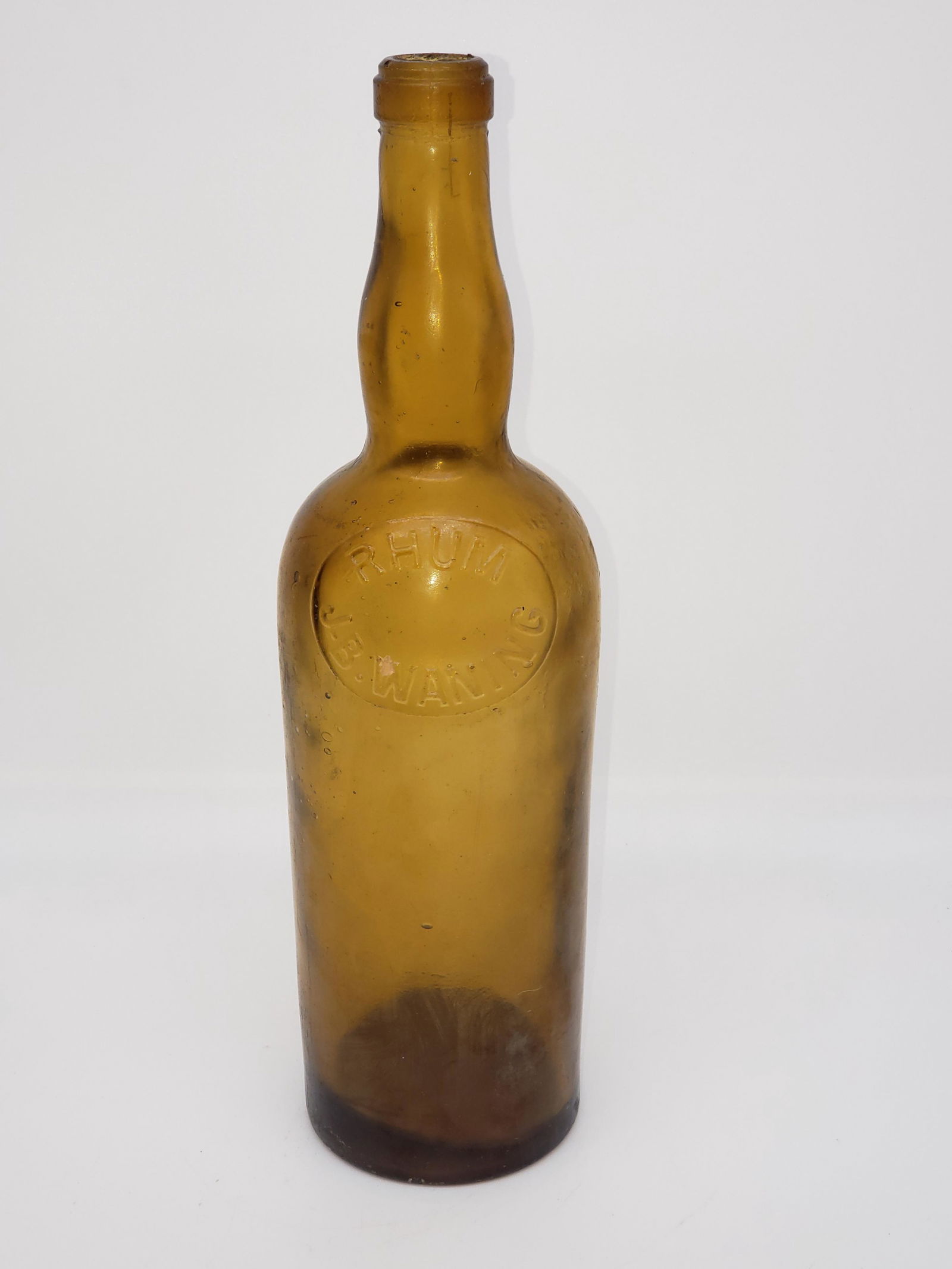 ANTIQUE OCEAN FIND BOTTLE "RHUM J.B. WANING" (1 of 5)