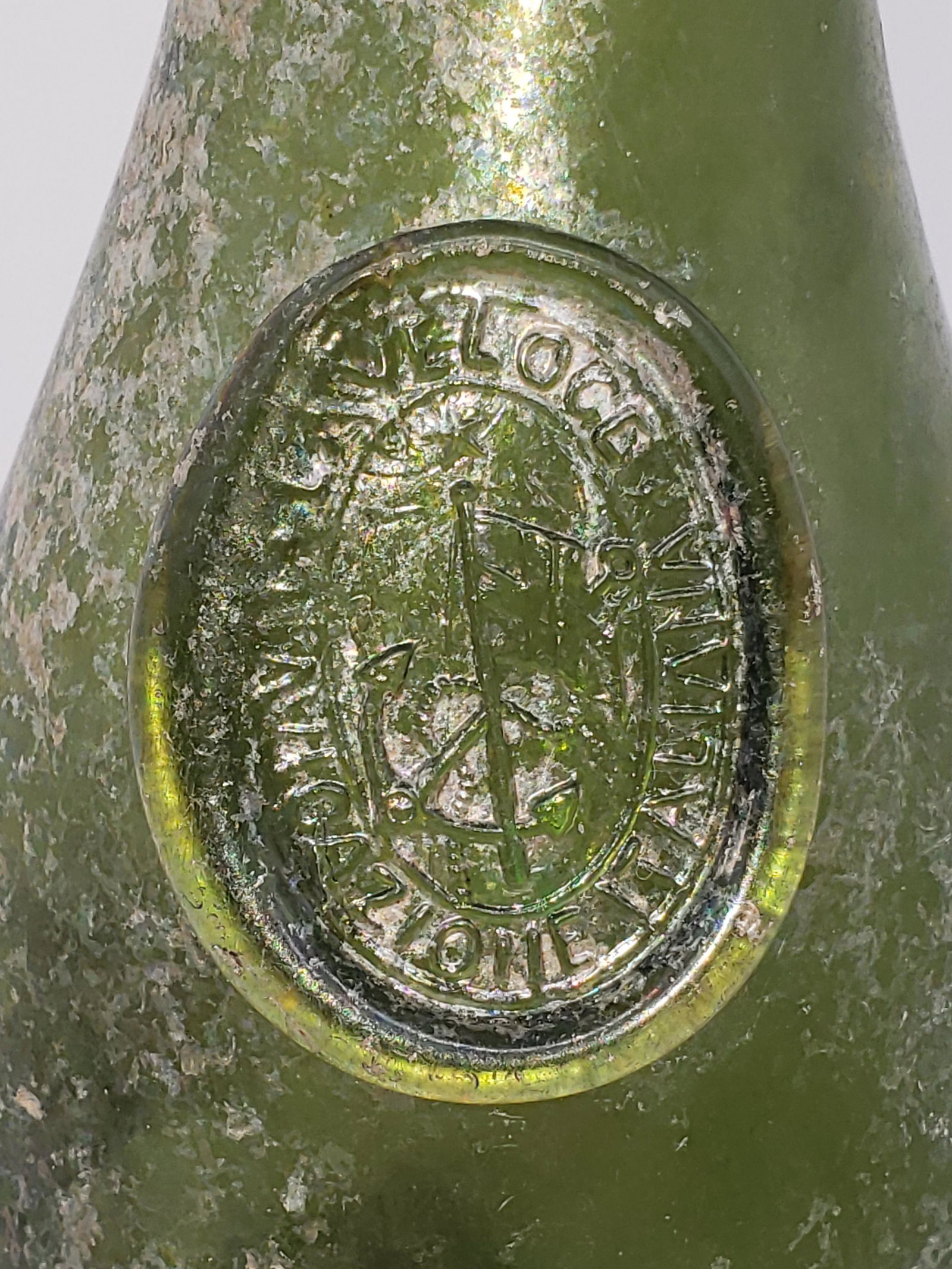 ANTIQUE OCEAN FIND BLACK GLASS BOTTLE: Antique Ocean Find Black Glass Italian Anchor Wine Bottle Piece is 12 1/2" x 3 3/8" All items from this Auction Located in in Hollywood Florida Warehouse For Shipping Call today for quote they have it