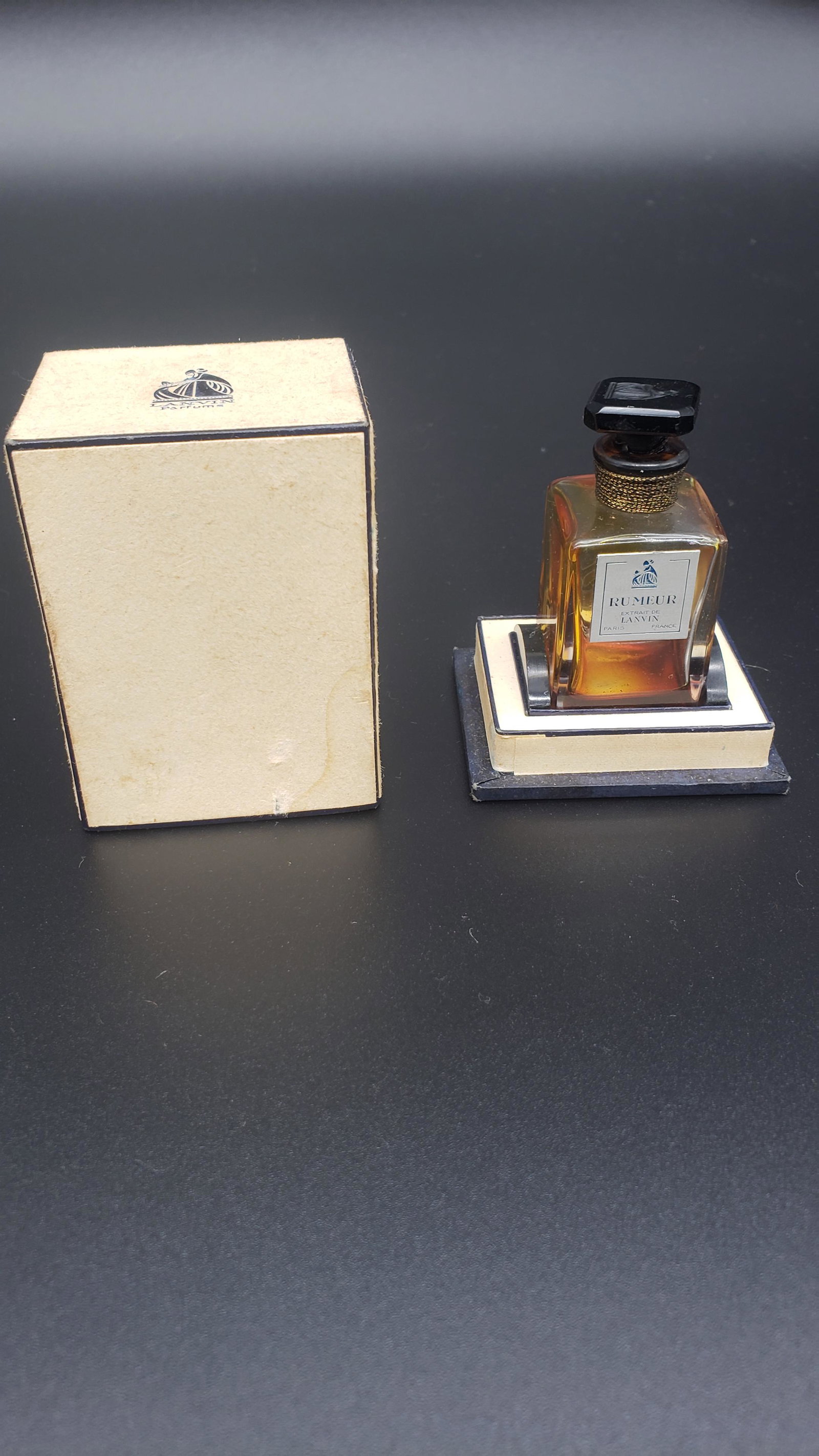 LANVIN PARIS RUMEUR EXTRAIT PERFUME BOTTLE: Lanvin Paris Rumeur Extrait Perfume Bottle All items from this Auction Located in in Hollywood Florida Warehouse For Shipping Call today for quote they have item numbers and Pak Mail is available for 