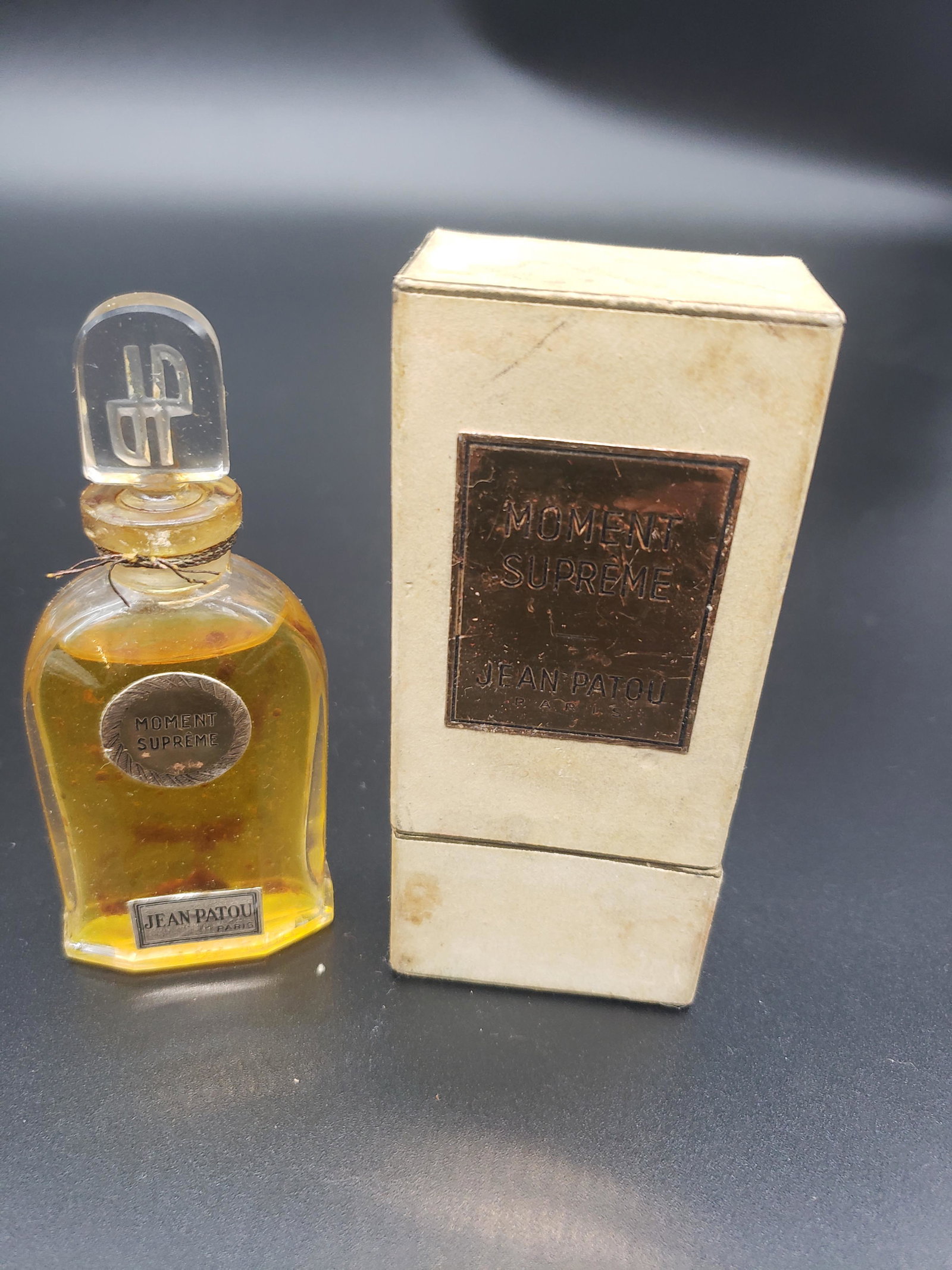 MOMENT SUPREM JEAN PATOU PARIS PARFUME: Moment Suprem Jean Patou Paris Parfume All items from this Auction Located in in Hollywood Florida Warehouse For Shipping Call today for quote they have item numbers and Pak Mail is available for all 