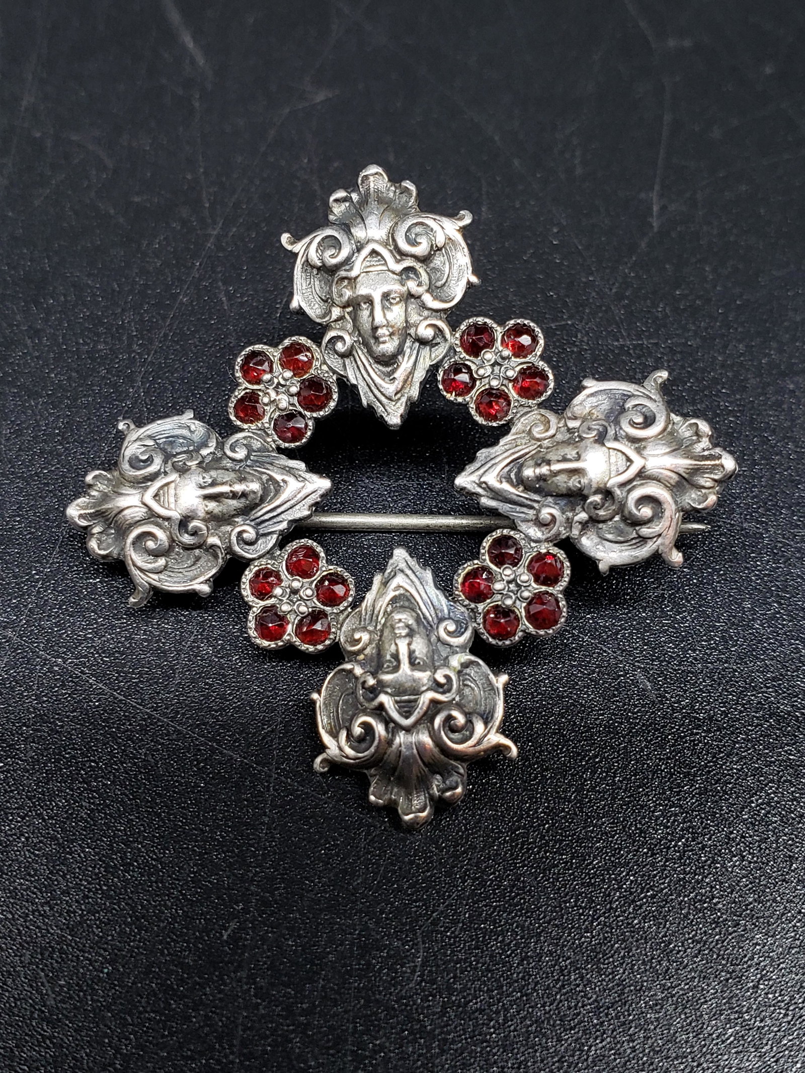 19TH CENTURY STERLING SILVER GARNETT PIN: 19th Century Sterling Silver Garnett Pin Piece is 1 1/2" Across All items Located in in Hollywood Florida Warehouse For Shipping Call today for quote they have item numbers and Pak Mail is available f