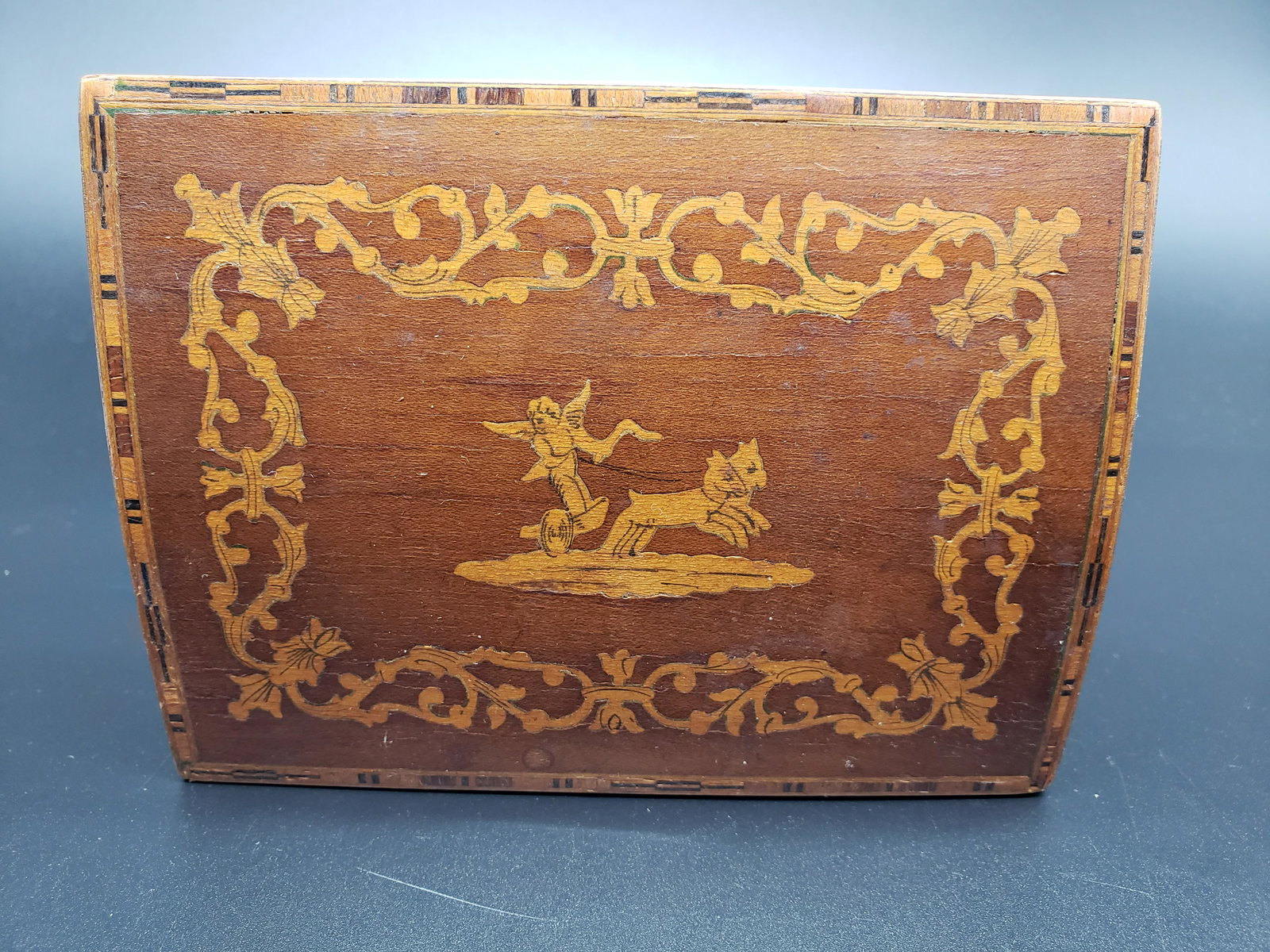 ANTIQUE MARQUIETRY CHERUB WOOD BOX: Antique Marquietry Cherub Wood Box Piece is 5 1/2" x 4 1/4" x 2 1/2" All items Located in in Hollywood Florida Warehouse For Shipping Call today for quote they have item numbers and Pak Mail is availa
