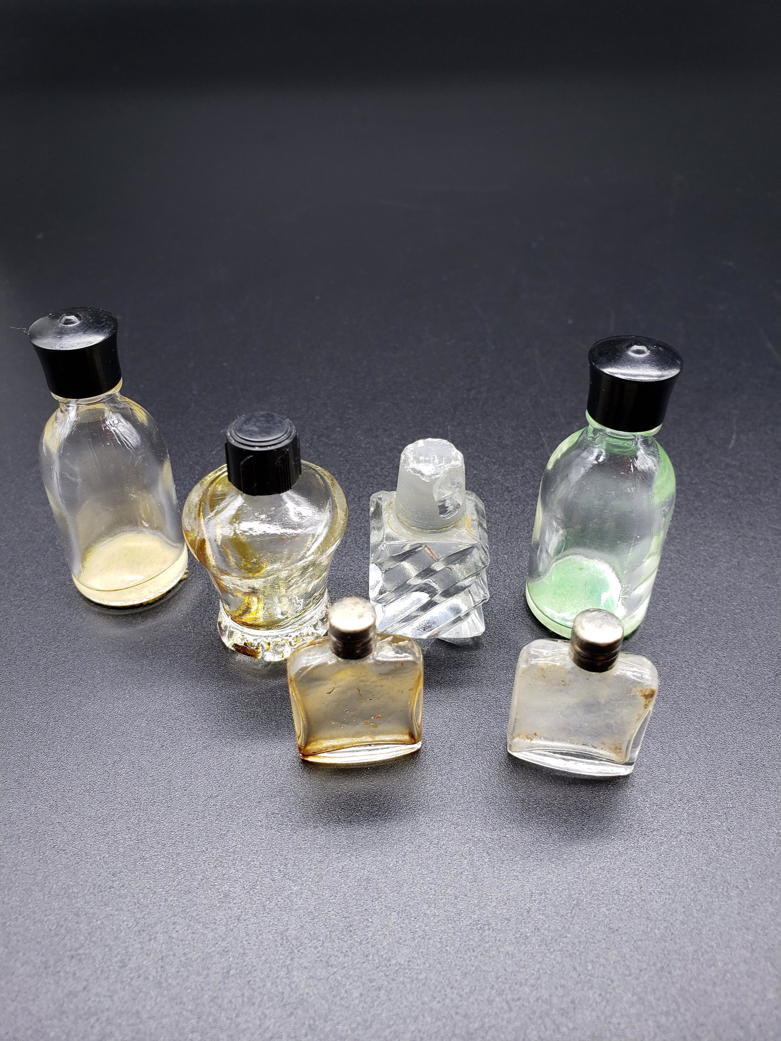 SET OF 6 VINTAGE PERFUMES: Set of 6 Vintage Perfumes Sizes Vary 2" and Under All items from this Auction Located in in Hollywood Florida Warehouse For Shipping Call today for quote they have item numbers and Pak Mail is availab