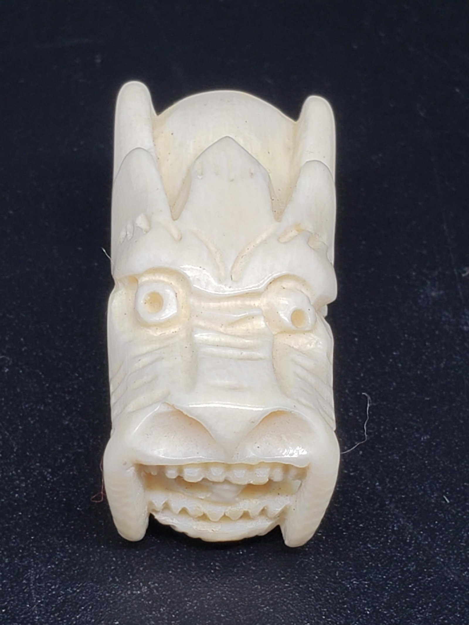 CARVED DRAGON NETSKI: Carved Dragon Netski Piece is 1 1/4" x 1/2" All items from this Auction Located in in Hollywood Florida Warehouse For Shipping Call today for quote they have item numbers and Pak Mail is available for