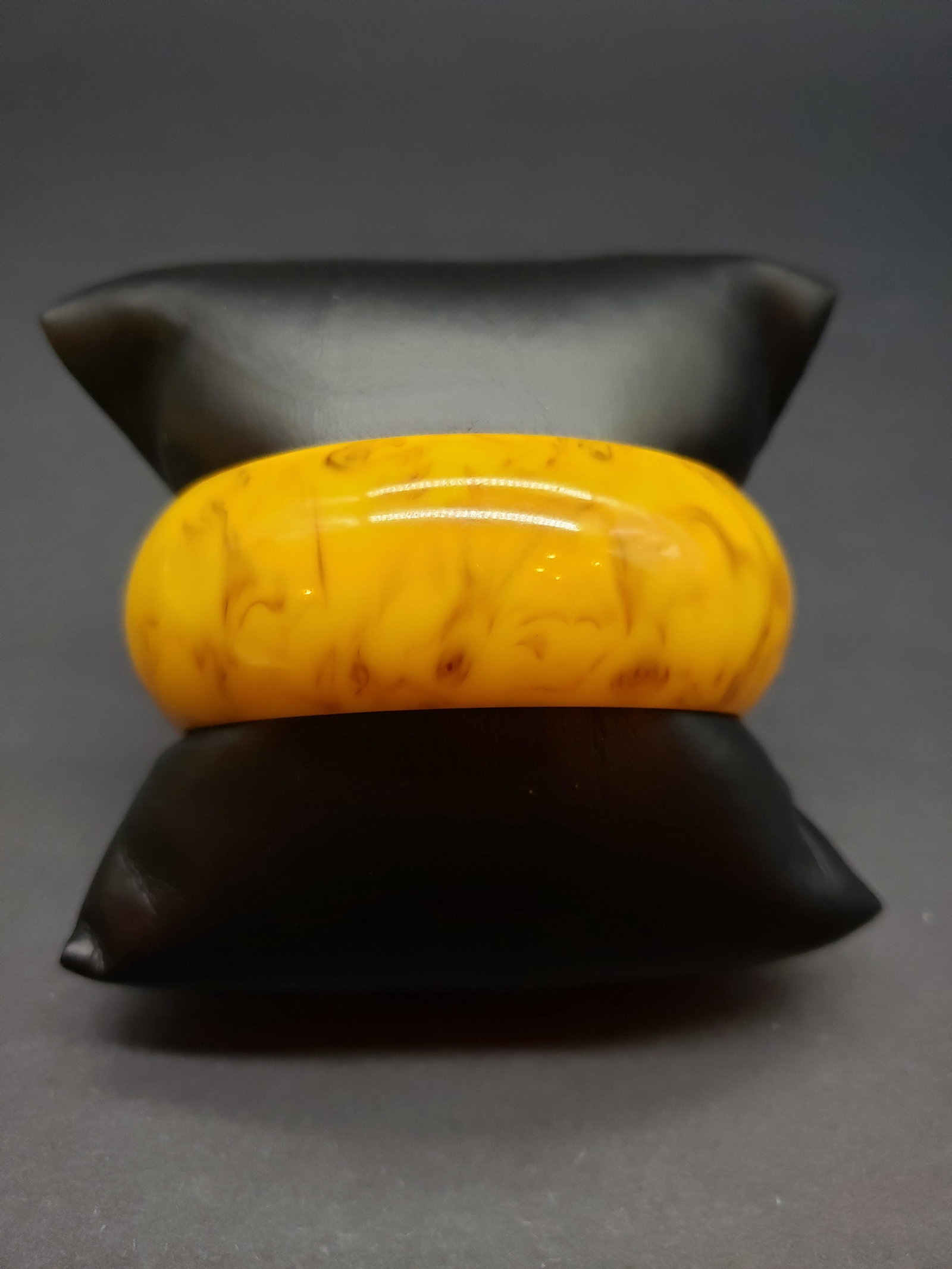 BAKELITE BANGLE: Bakelite Bangle Opening is 2 1/2" x 1" Thick All items Located in in Hollywood Florida Warehouse For Shipping Call today for quote they have item numbers and Pak Mail is available for all your custom 