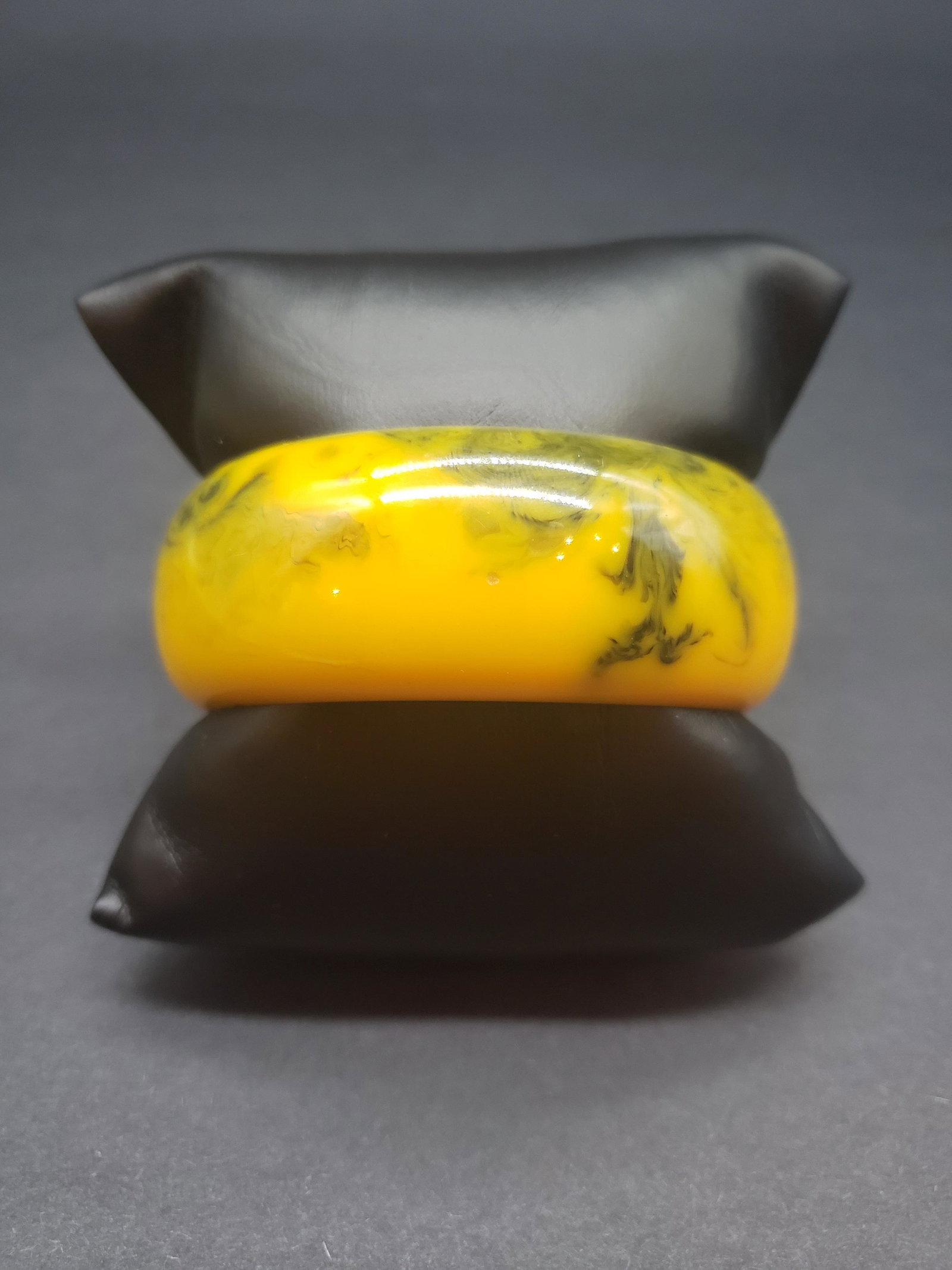 BAKELITE BANGLE: Bakelite Bangle Opening is 2 1/2" x 1 1/8" Thick All items Located in in Hollywood Florida Warehouse For Shipping Call today for quote they have item numbers and Pak Mail is available for all your cus