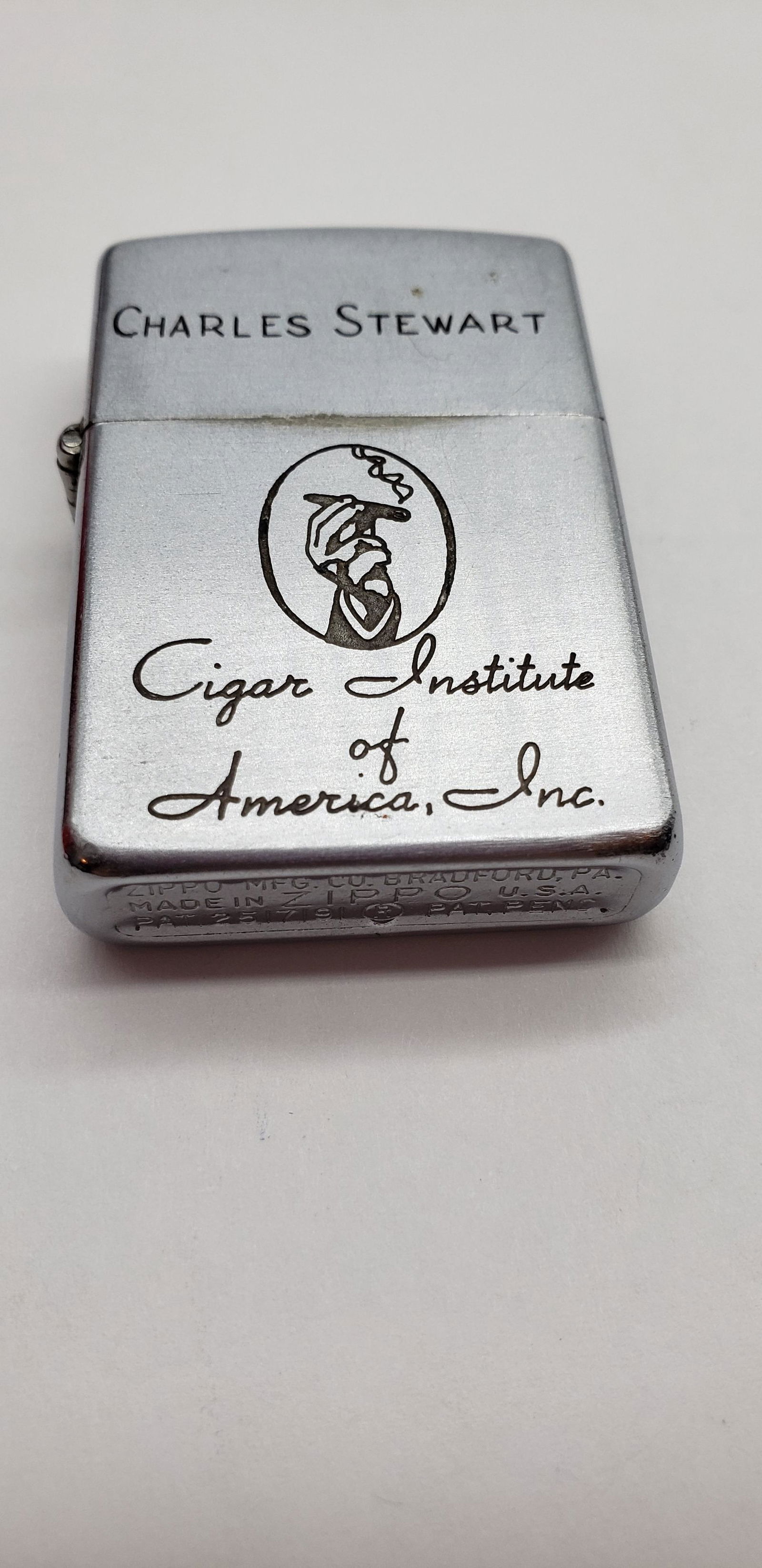 ZIPPO LIGHTER CHARLES STEWART CIGAR INSTITUTE OF: Zippo Lighter Charles Stewart Cigar Institute of America, Inc. Piece is 2 1/4" x 1 1/2" All items Located in in Hollywood Florida Warehouse For Shipping Call today for quote they have item numbers and