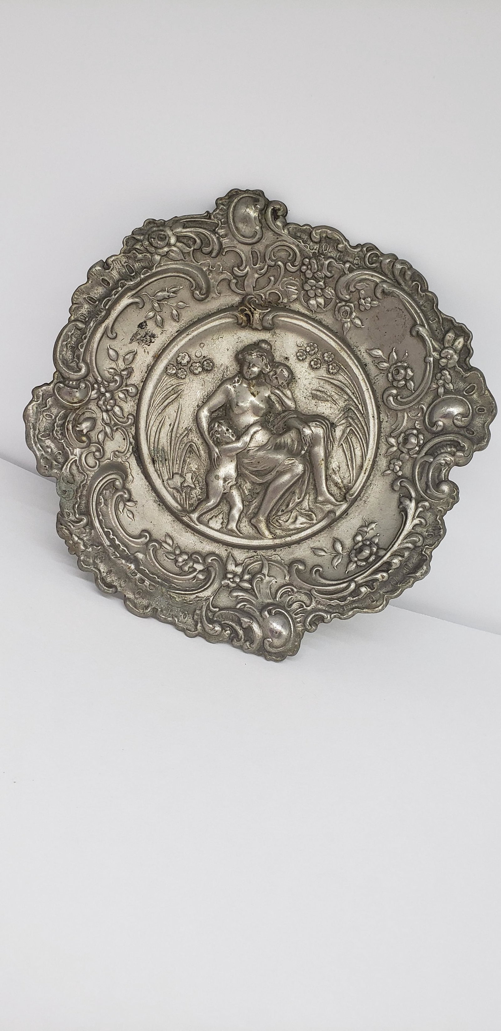 OLD WEST LADY AND CHERUB TIP TRAY: OLD WEST LADY AND CHERUB TIP TRAY 7 1/2" ACROSS All items Located in in Hollywood Florida Warehouse For Shipping Call today for quote they have item numbers and Pak Mail is available for all your cust