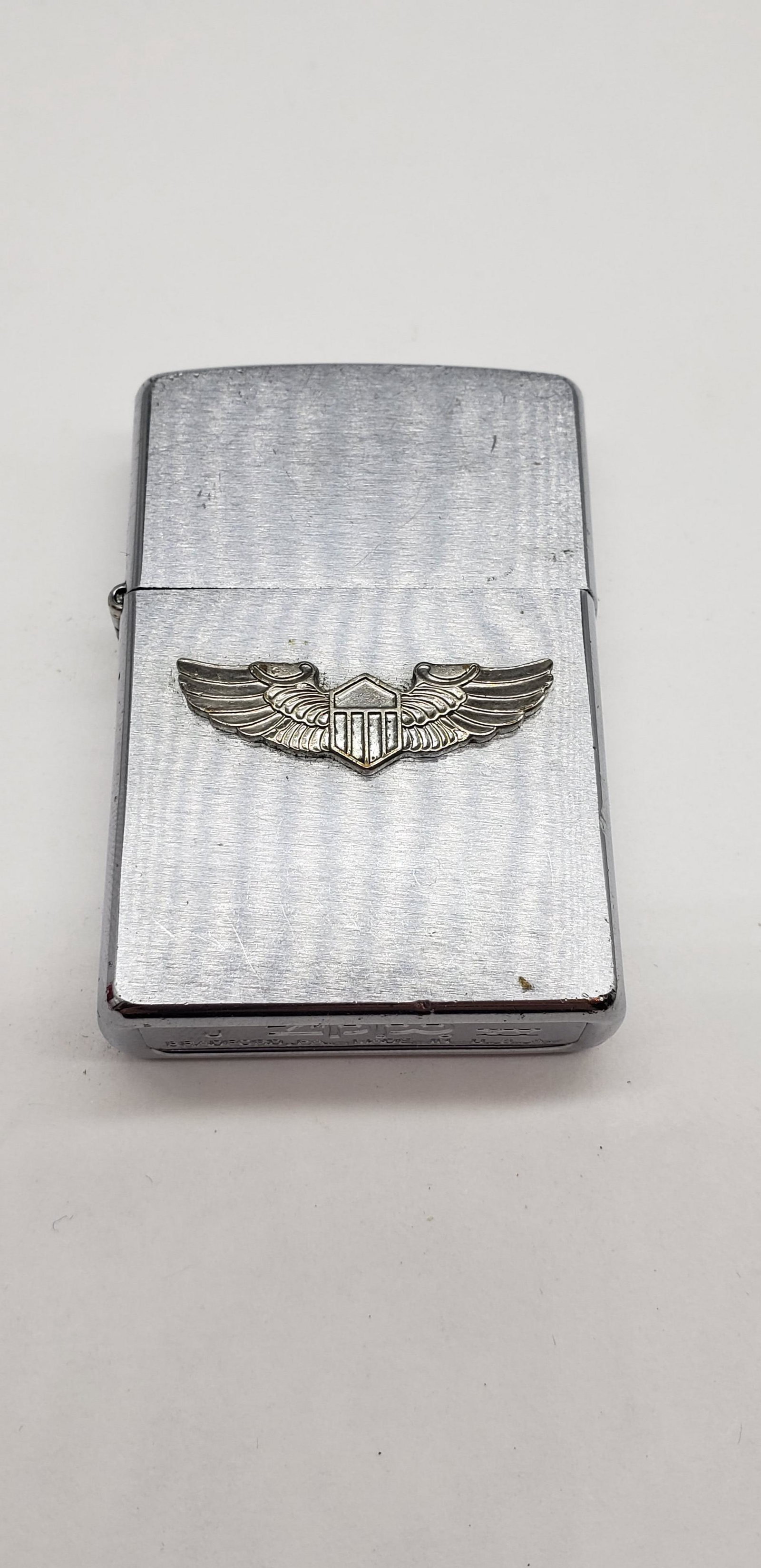 VINTAGE ZIPPO LIGHTER: VINTAGE ZIPPO LIGHTER 2 1/4" X 1 1/2" All items Located in Hollywood Florida Warehouse. Thank you for your inquiry about shipping your precious item/items purchased at Puckett Auctions. Please note th