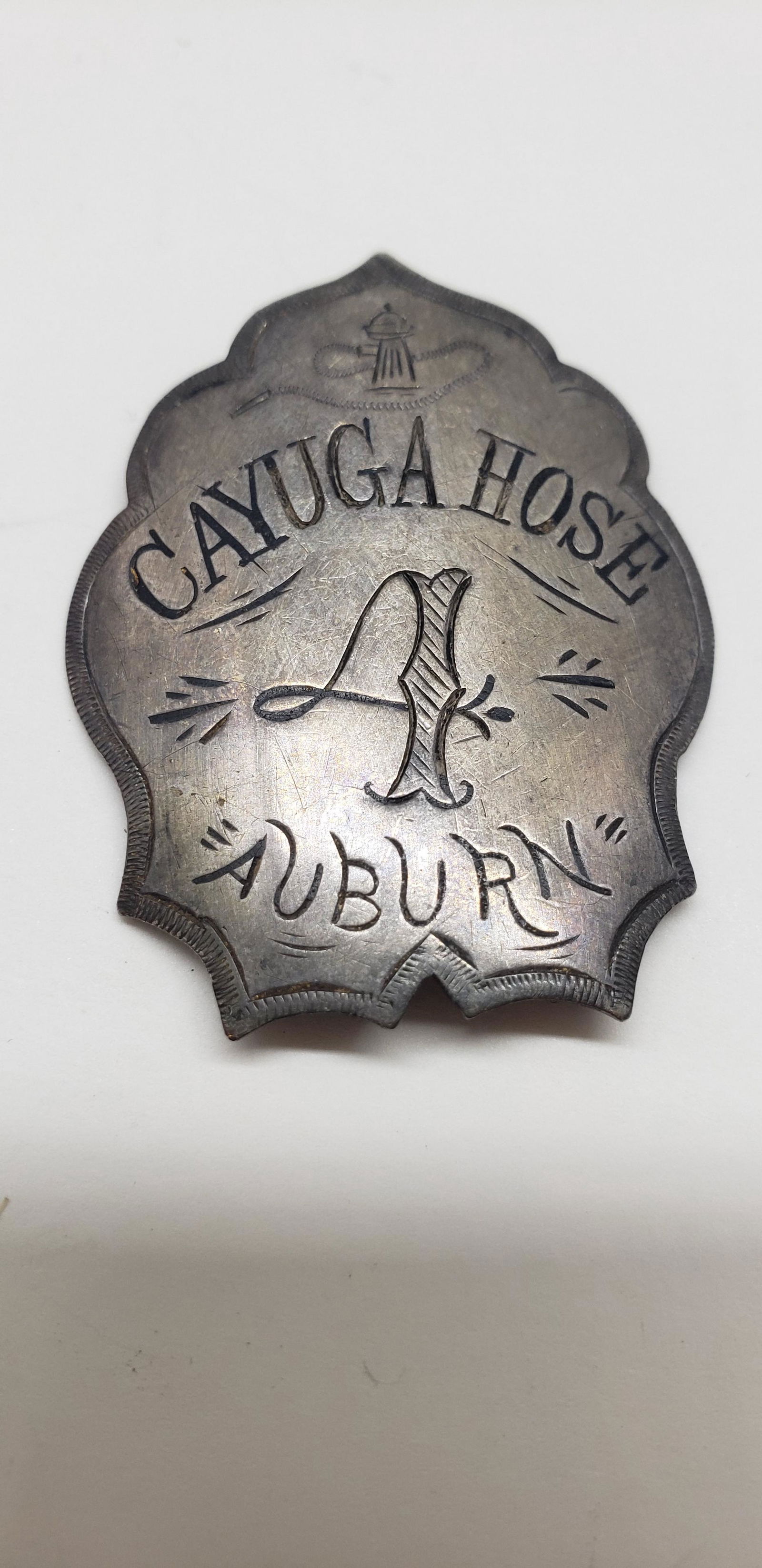 CAYUGA HOSE AUBURN FIREMAN BADGE (1 of 2)