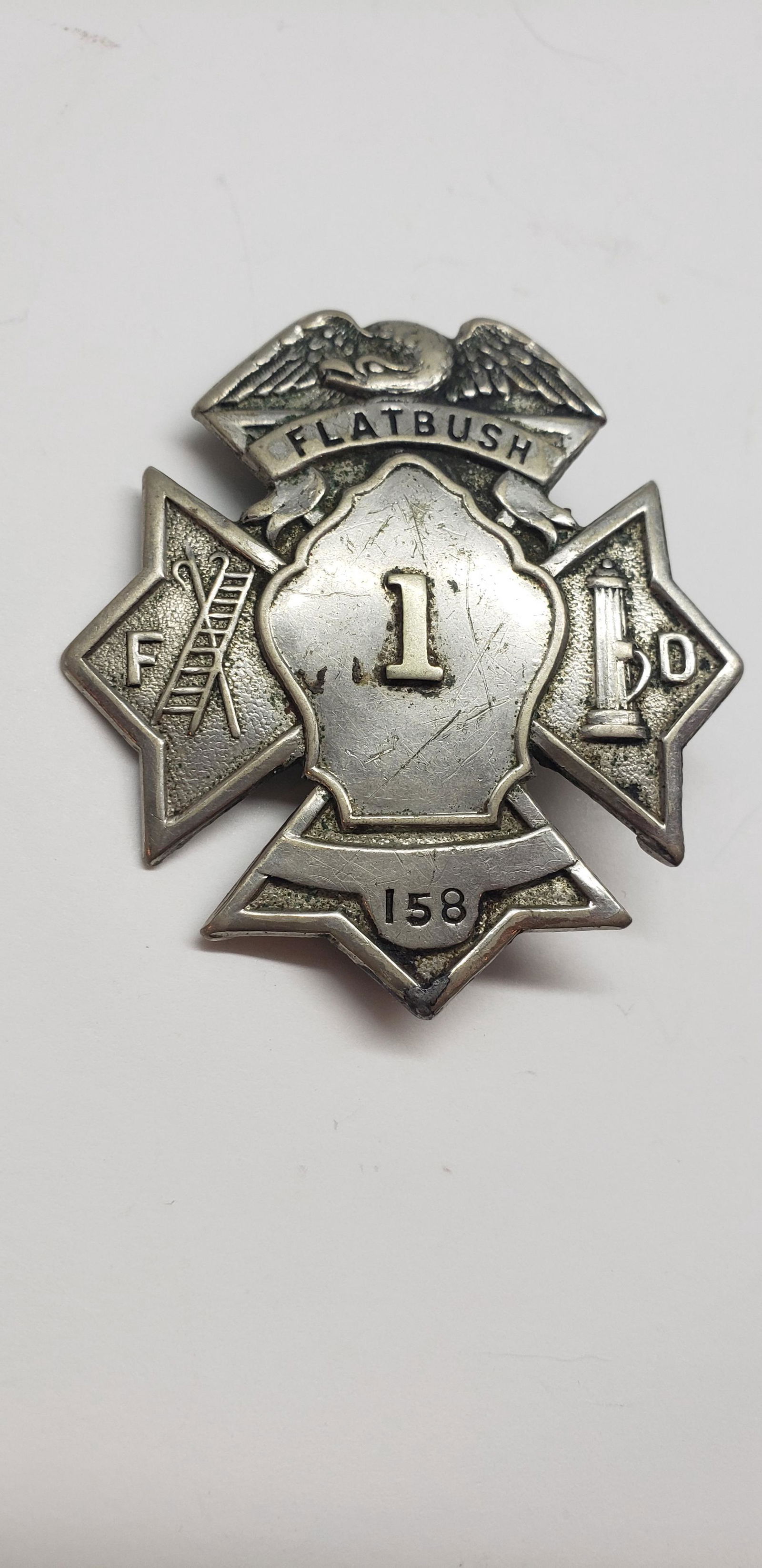 FLATBUSH 1 FIRE DEPARTMENT BADGE (1 of 2)
