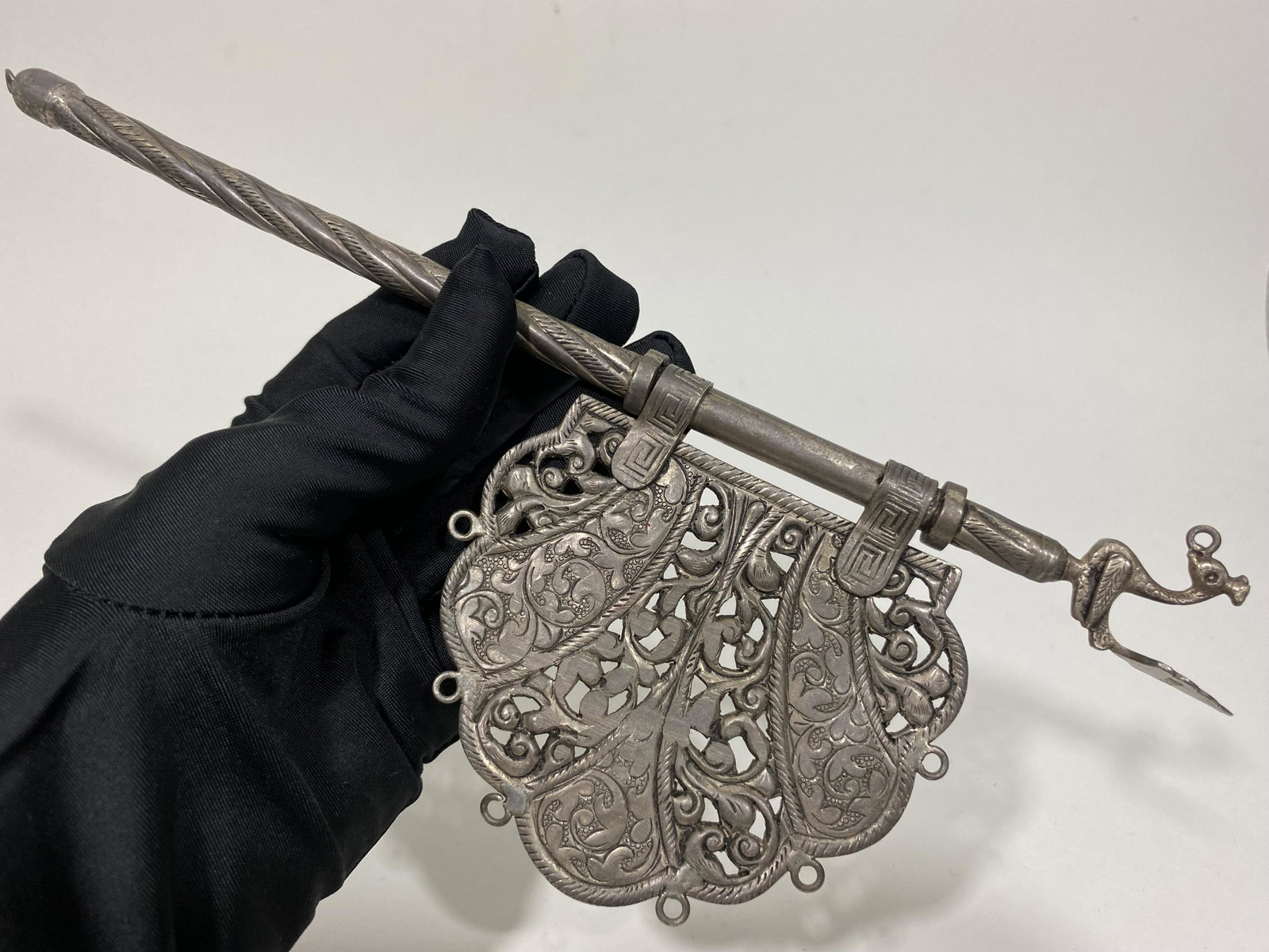 ETHNIC INDIAN SILVER PANKHI DECORATED RITUAL TEMPLE HAND FAN: ETHNIC INDIAN SILVER PANKHI DECORATED RITUAL TEMPLE HAND FAN——MARKED SILVER - MEASURES APPROXIMATELY —3.5"X10"—— OUR CURRENT AUCTION FEATURES MANY MORE PRE-COLUMBIAN AND 