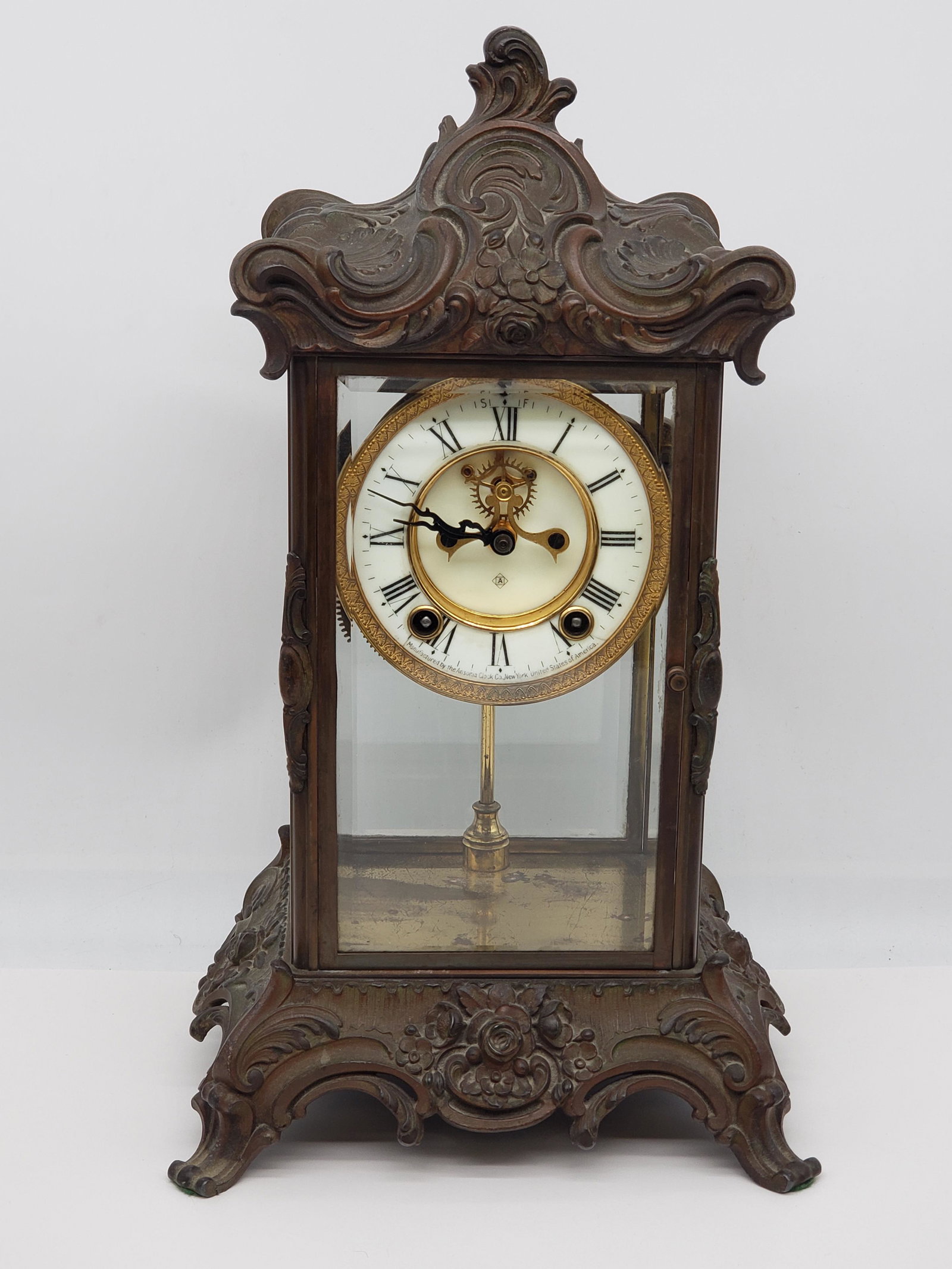 ANSONIA GILT BRONZE MANTLE CLOCK: ANSONIA GILT BRONZE MANTLE CLOCK WITH BEVELED GLASS DOORS 15 3/4" X 9" All items Located in Hollywood Florida Warehouse. Thank you for your inquiry about shipping your precious item/items purchased at