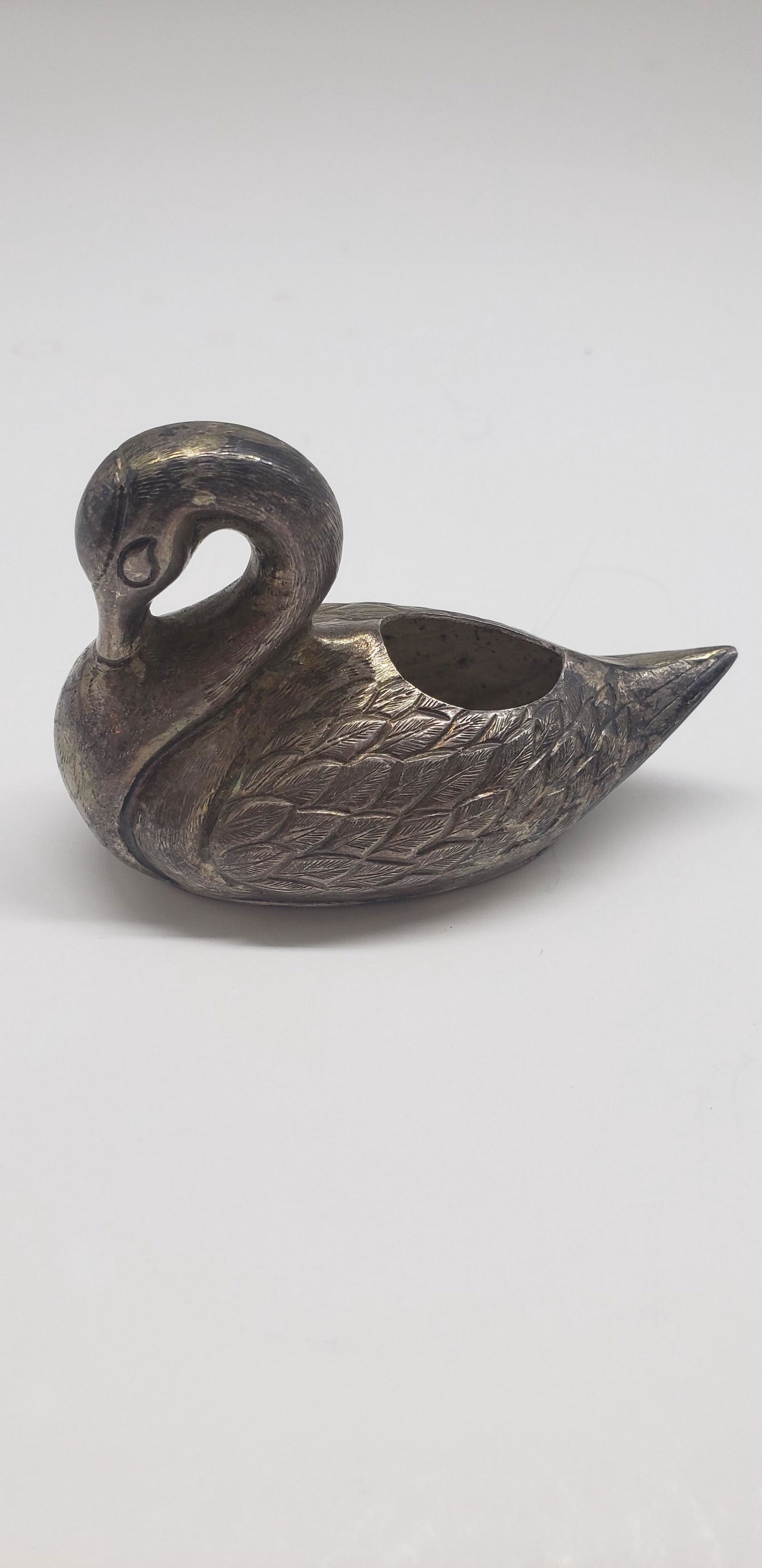 STERLING SIVLER SWAN SALT CELLAR: STERLING SILVER SWAN SALT CELLAR 2" X 3" All items Located in Hollywood Florida Warehouse. Thank you for your inquiry about shipping your precious item/items purchased at Puckett Auctions. Please note