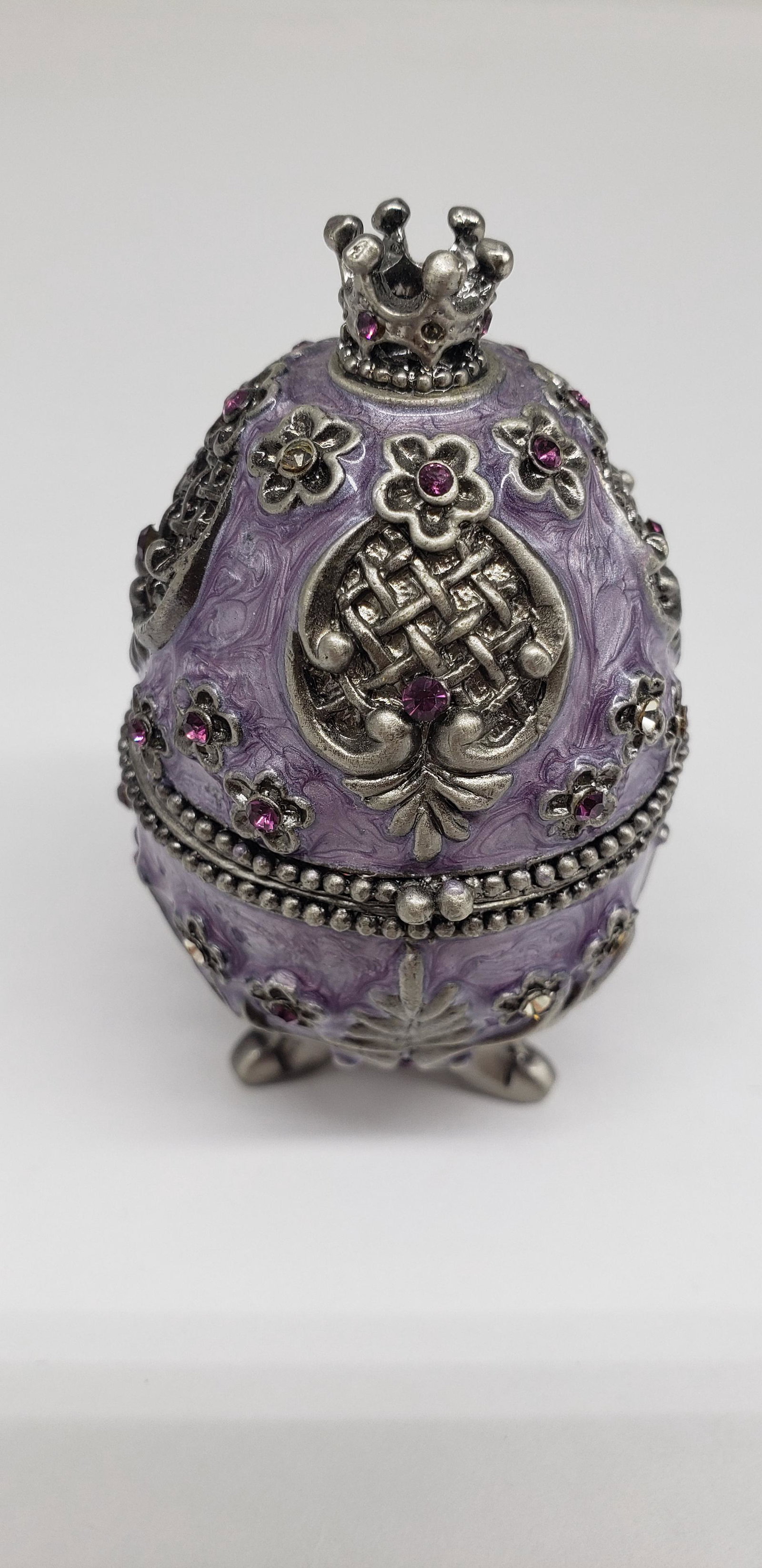 VUCCELLI ENAMELED & JEWELED PURPLE EGG: VUCCELLI ENAMELED & JEWELED PURPLE EGG 3" X 1 3/4" All items Located in Hollywood Florida Warehouse. Thank you for your inquiry about shipping your precious item/items purchased at Puckett Auctions. P