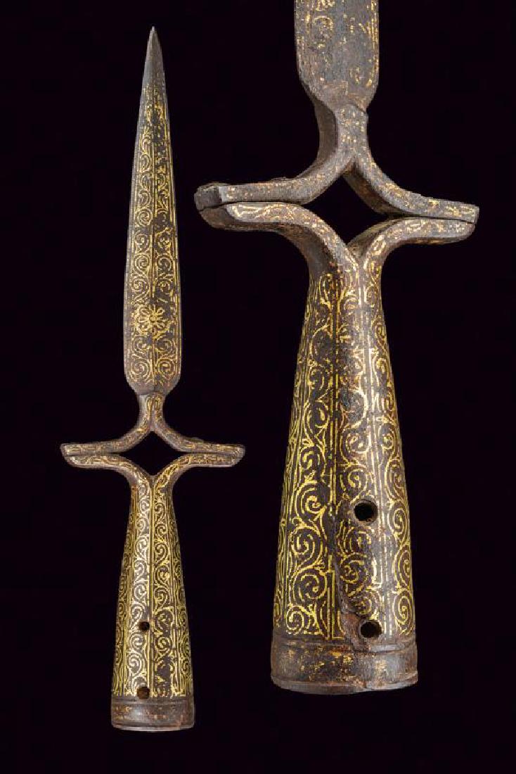 A spontoon, dating: circa 1800, provenance: India,: A spontoon, dating: circa 1800, provenance: India, dating: circa 1800, provenance: India, Iron, leave-shaped cusp, of lenticular section, remains of spirals and flowers inlaid in gold. Base bifurcates