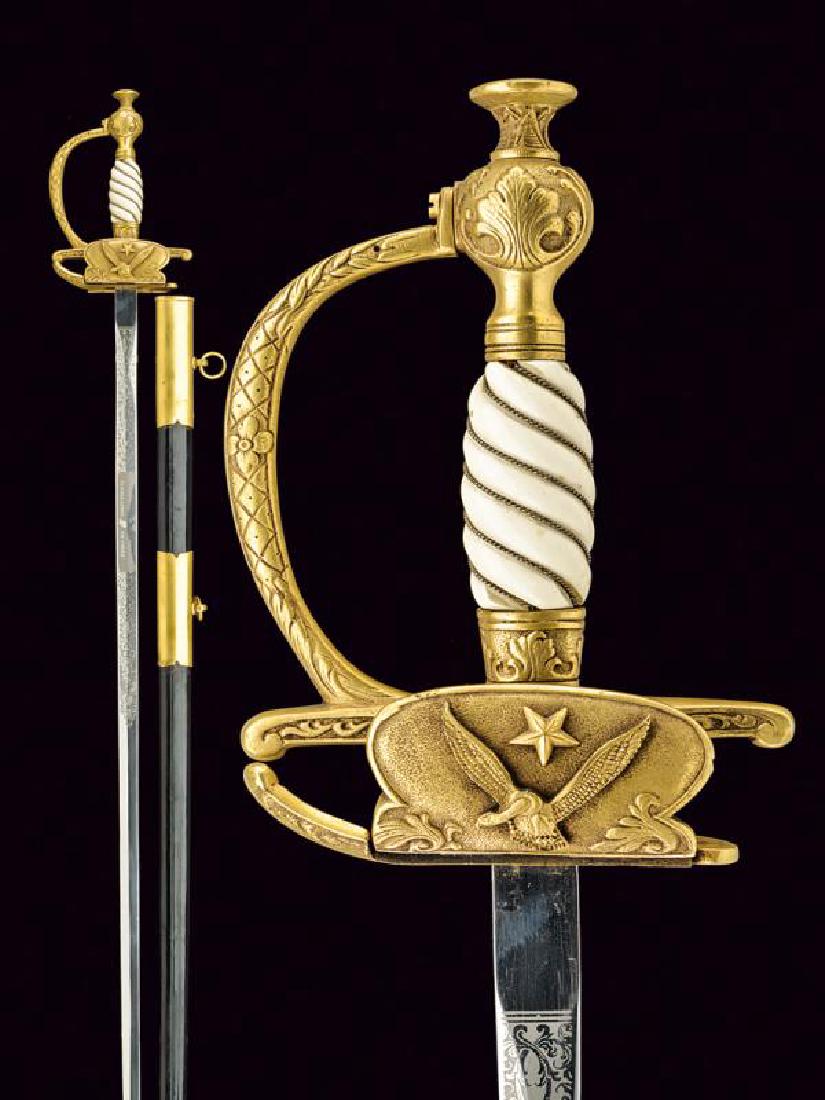 A generals sword: dating: 20th Century provenance: Chile, Straight, double-edged blade, engraved till the half with an eagle, inscription 'FUERZA AEREA DE CHILE' and floral motifs, tang marked 'EBS SOLINGEN'; brass hil