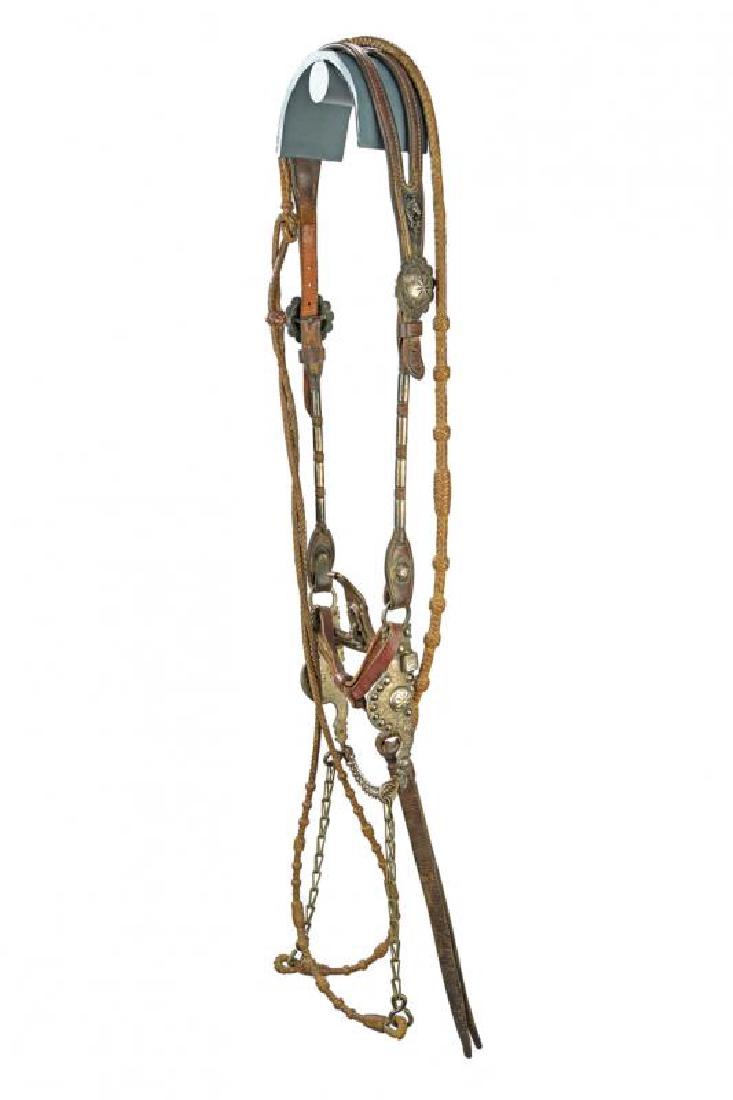 A silver decorated bridle with bit (1 of 2)