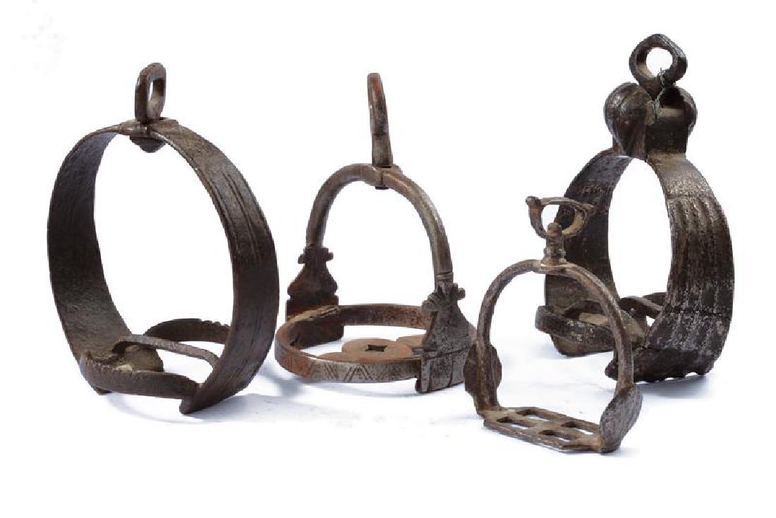 A lot of four stirrups: A lot of four stirrups dating: 16th-18th Century provenance: Different countries, All different and in iron. One very interesting, coming from an old Pouilhac collection. height 10.5 - 16 cm.