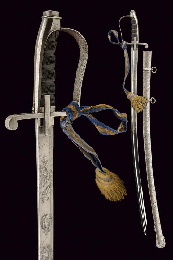 A 1855 model officer's sabre: dating: Third quarter of the 19th Century provenance: Italy, Curved, single-and false-edged blade, tip hollowed on the back, double fuller at the foible and single, large fuller on the rest of surface