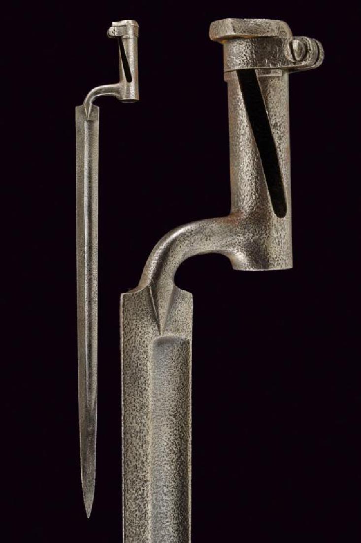 A socketsabre- bayonet: dating: Early 19th Century provenance: Austria, Long, grooved bade with a stamp on the back. The surface with rust damages. length 70.5 cm.