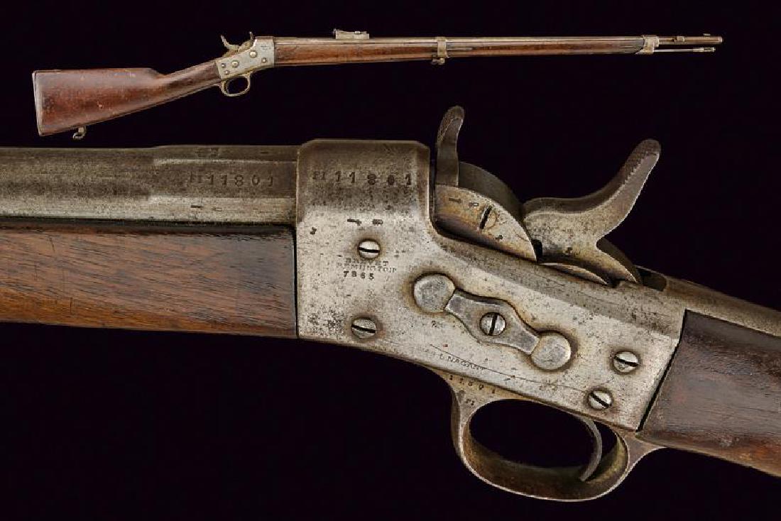 A Remington Rolling Block Rifle: dating: Third quarter of the 19th Century provenance: Papal States, Round, rifled, 13 mm cal. barrel, with octagonal breech, provided with a slot for a bayonet, foldaway and adjustable rear sight, wit