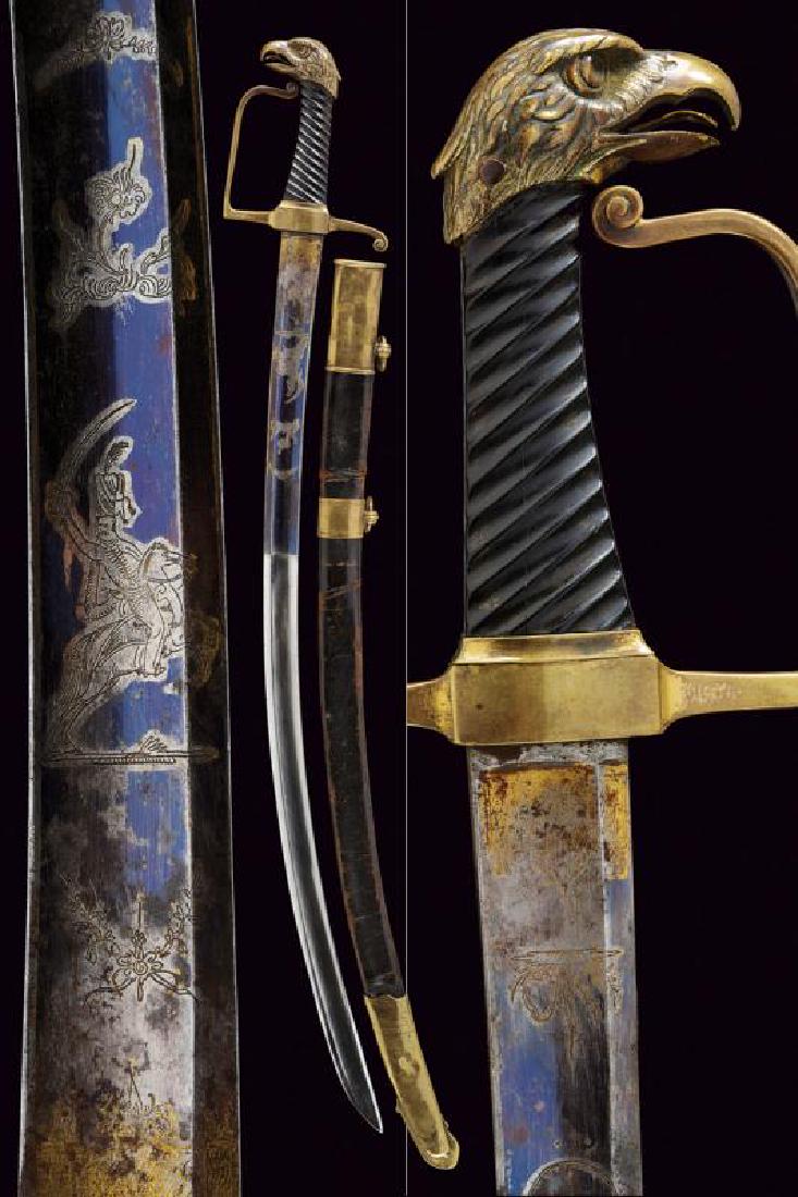 An interesting cavalry officer's sabre: dating: First Empire provenance: Cisalpine Republic, Curved, single-and short false-edged blade with large central fuller, first part engraved and gilded (parts missing) with a hussar, trophy, sun and