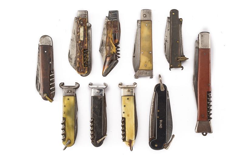 A lot of ten hunting folding knives: dating: 20th Century provenance: Europe, All different, all with multi-blades/tools. Some are rare. Interesting lot. length open 17.5 - 29.5 cm.