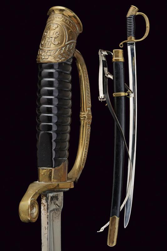 A 1909 model officer's sabre: dating: about 1910 provenance: Russian Empire, Curved, single-and false-edged blade with large central fuller and tang, various stamps. Gilded brass mono-quillon hilt, decorated with floral motifs, ca