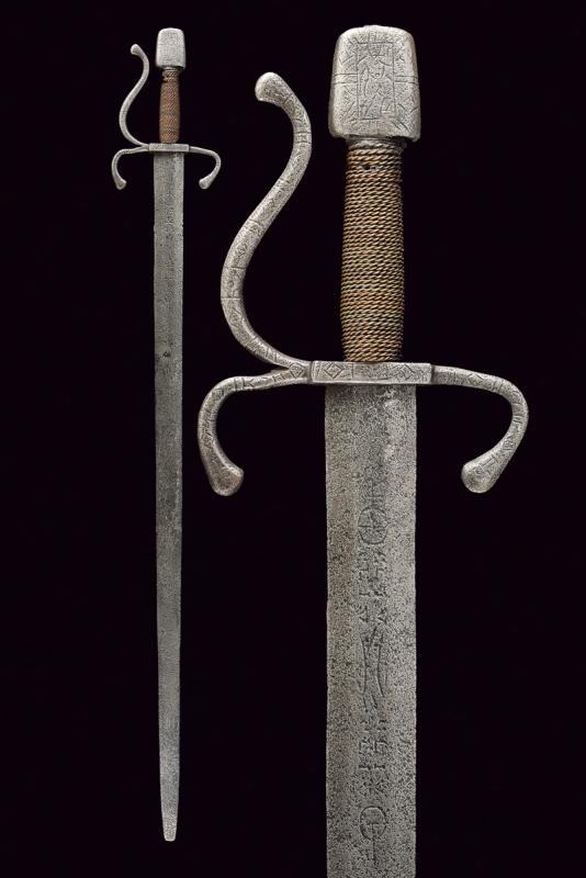 A rapier: dating: 16th Century provenance: Germany, Straight blade of lenticular section. With almost flat tip. Remains of crowned head mark at the forte, and traces of other marking. Iron hilt with arm curved 
