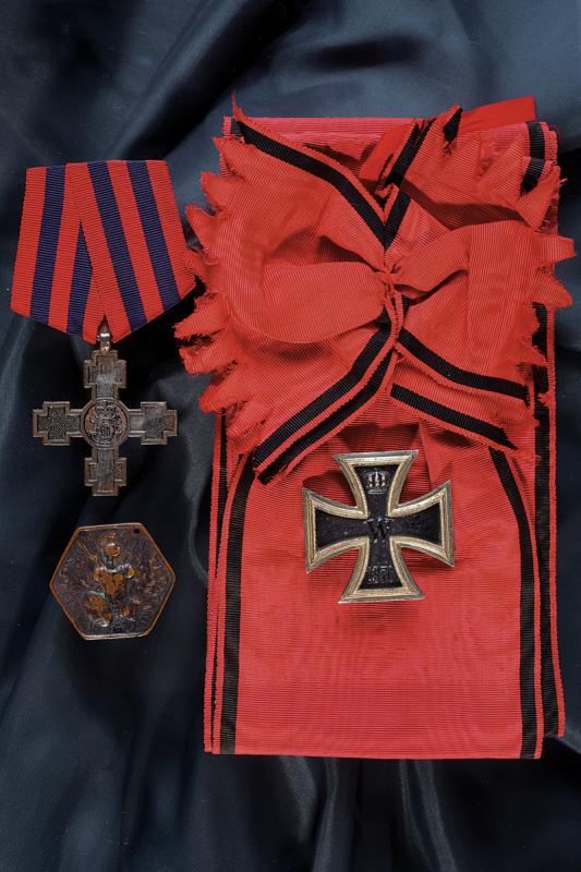 A lot of medals and ribbon: dating: 20th - 21st Century provenance: Different countries, Trecerea Dunarii 1877 cross on a modern ribbon, hexagonal bronze medal with trophies and inscription 'VOLONTARIO'; iron cross of first clas