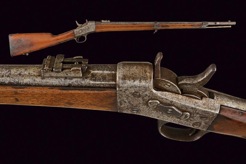 A rare Remington Rolling Block rifle for gendarmerie,: dating: Third quarter of the 19th Century provenance: Italy, Round, rifled, 13 mm cal. barrel, with fore-sight, slot for a bayonet, and adjustable and foldaway rear sight; octagonal breech with remain