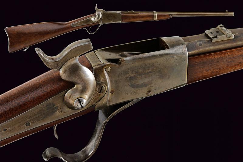 A breechloading Peabody carbine: dating: Third quarter of the 19th Century provenance: Swiss, Round, rifled, 10.4 cal. barrel, with fore-sight and rear sight of four heights, with foldaway sight-leaf, remains of Helvetian stamps, SN 