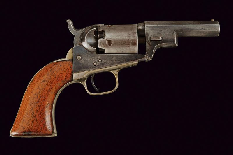 A Colt 'Wells Fargo' Model 1849 Pocket Revolver: dating: 1852 provenance: USA, Octagonal, cal. 31 barrel for 3', with brass fore-sight, remains of marking among the curly brackets 'ADDRESS SAM COLT...' (the rest is unreadable). Model without cartrid