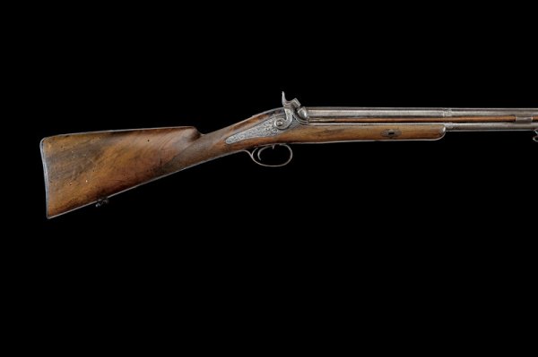43: An over and under percussion shotgun