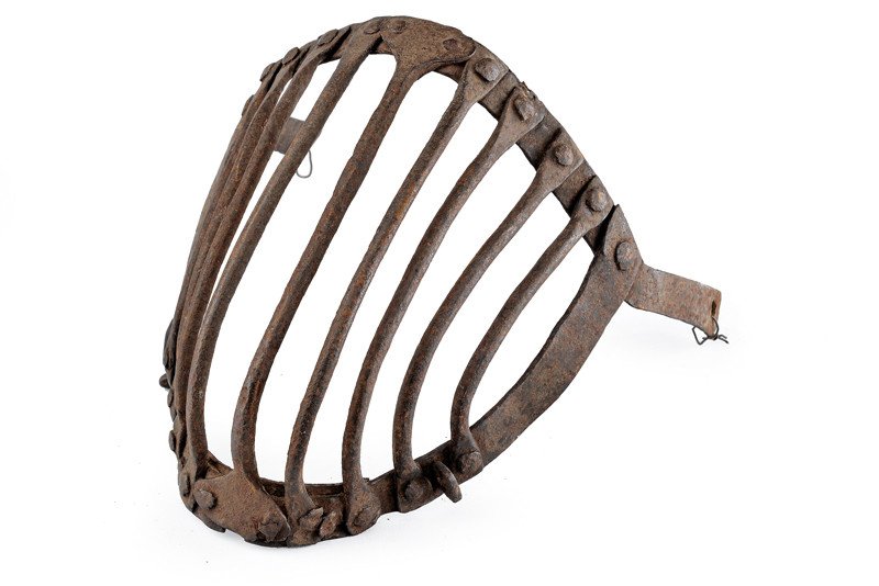 A visor for a "Gioco del Ponte" helmet: dating: late 17th Century provenance: Central Italy Cage-visor, with flat upper band provided with arms featuring holes to fix it on a skull; the lower plaque consisting of two joint elements; cage wi