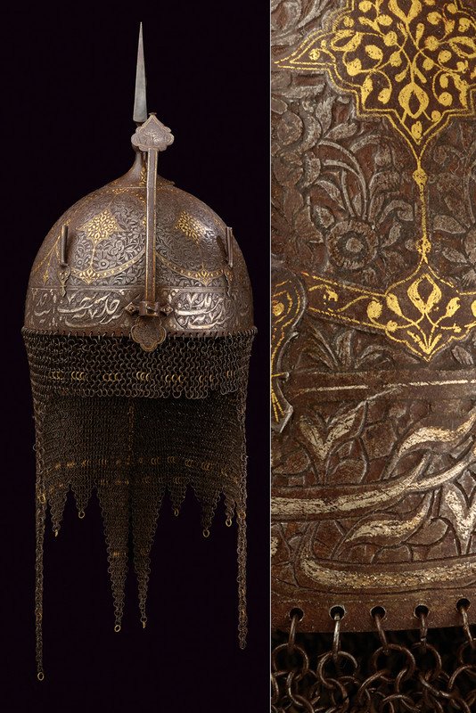 A silver-inlaid khula-khud: dating: circa 1800 provenance: Indopersia Hemispherical, iron skull, surmounted by a squared cusp (without engravings), on a round base with long neck and knot. The external surface of the helmet fine