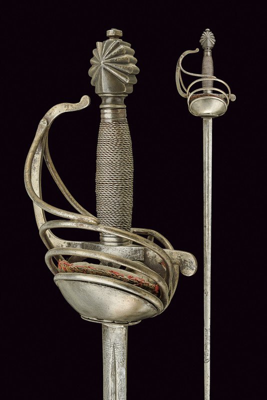 A composite rapier, dating: 18th Century, provenance:: A composite rapier, dating: 18th Century, provenance: Europe, dating: 18th Century, provenance: Europe, Straight, double-edged blade grooved at the first part, with remains of engravings depicting tro