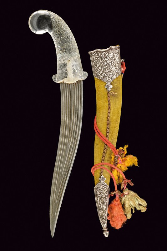 A kandshar with Rock Crystal hilt, dating: circa 1900,: A kandshar with Rock Crystal hilt, dating: circa 1900, provenance: India, dating: circa 1900, provenance: India, Curved, double-edged blade made of damask, provided with eight grooves on all its lengt