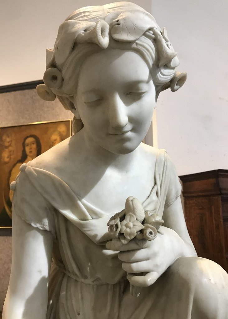 Marble "Springtime"by Joseph Mozier(American, 1870): Large marble "Springtime" or "Flower Girl" by Joseph Mozier, c.1870.The marble alone is 31"high and 16"wide.THE LARGE RED MARBLE PEDESTAL IS INCLUDED IN THIS LOT, it is 32" x 18" AND CAN ROTATE THE ST