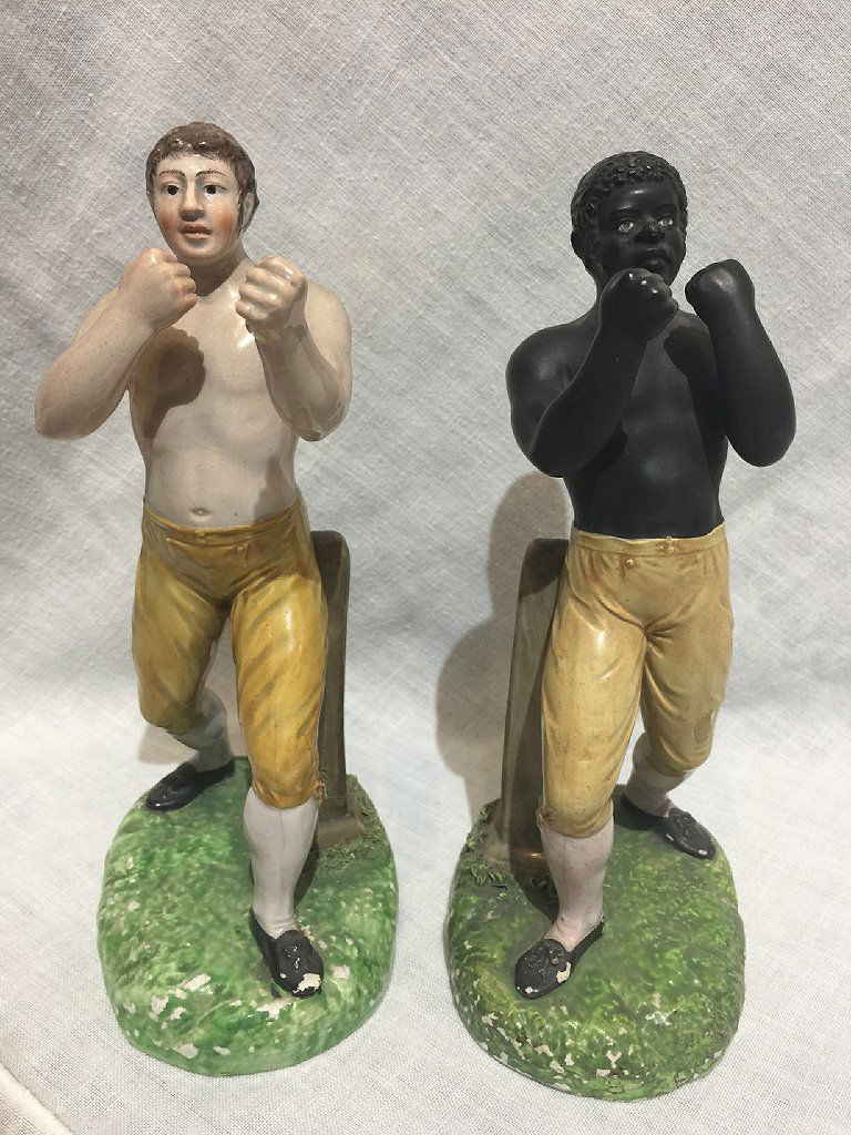 Extremely rare pearlware Tom Cribb vs Tom Molineux 19th: Pearlware Tom Cribb vs Tom Molineux(also Molyneux), circa 1810.Both approximately 9"high,width:4.8".Pearlware is a type of earthenware that was popular during the late 18th century/early 19th century.