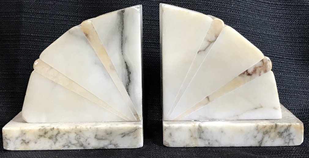 Alabaster bookends: Alabaster bookends. H 3.5" x W 3.5" x D 2.5".