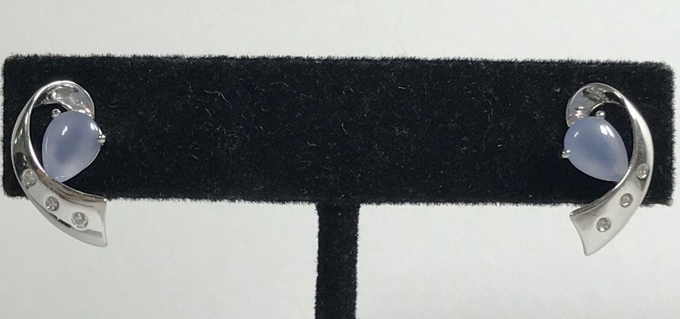 14k diamond and moonstone earrings, 1.5 dwts: 14k diamond and moonstone earrings