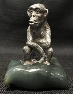 Russian silver monkey on stone base, c.1980: Russian silver monkey on stone base. Height 3".There are Russian silver marks on the side of "88" and indistinct maker's mark.Circa 1980.The green stone might be jade or aventurine, definitely a